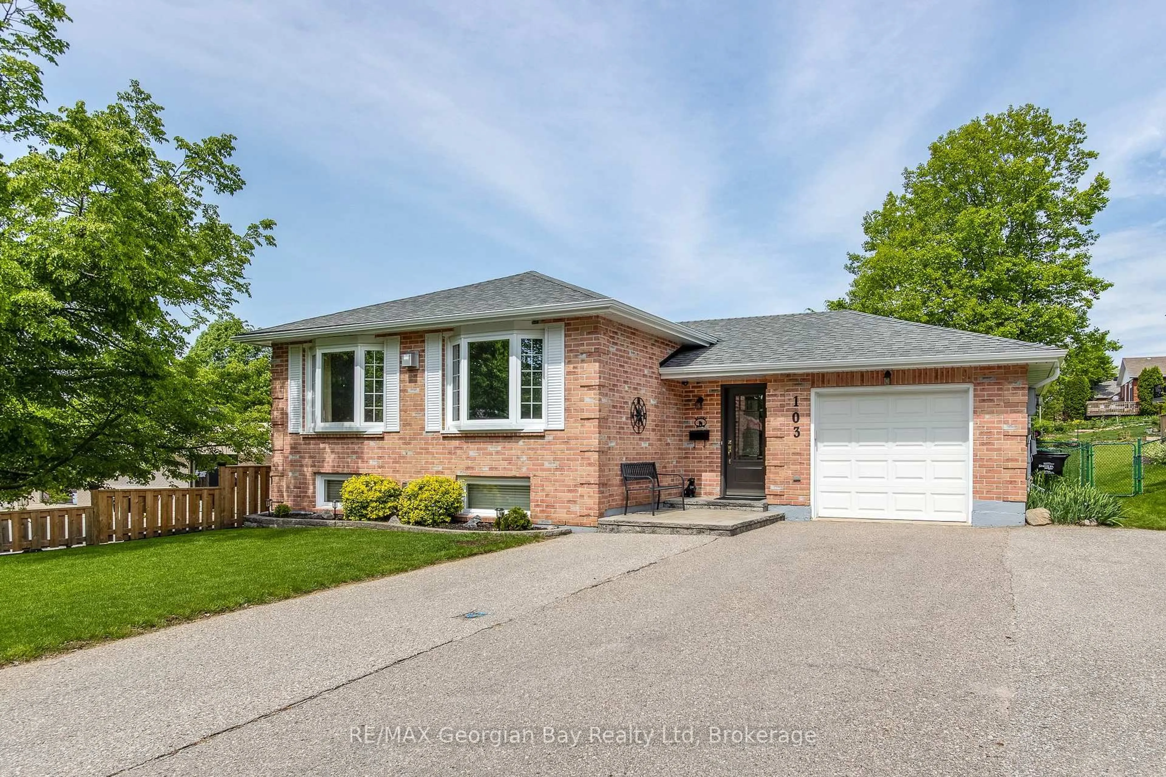 Home with brick exterior material, street for 103 Woodland Dr, Midland Ontario L4R 4V3