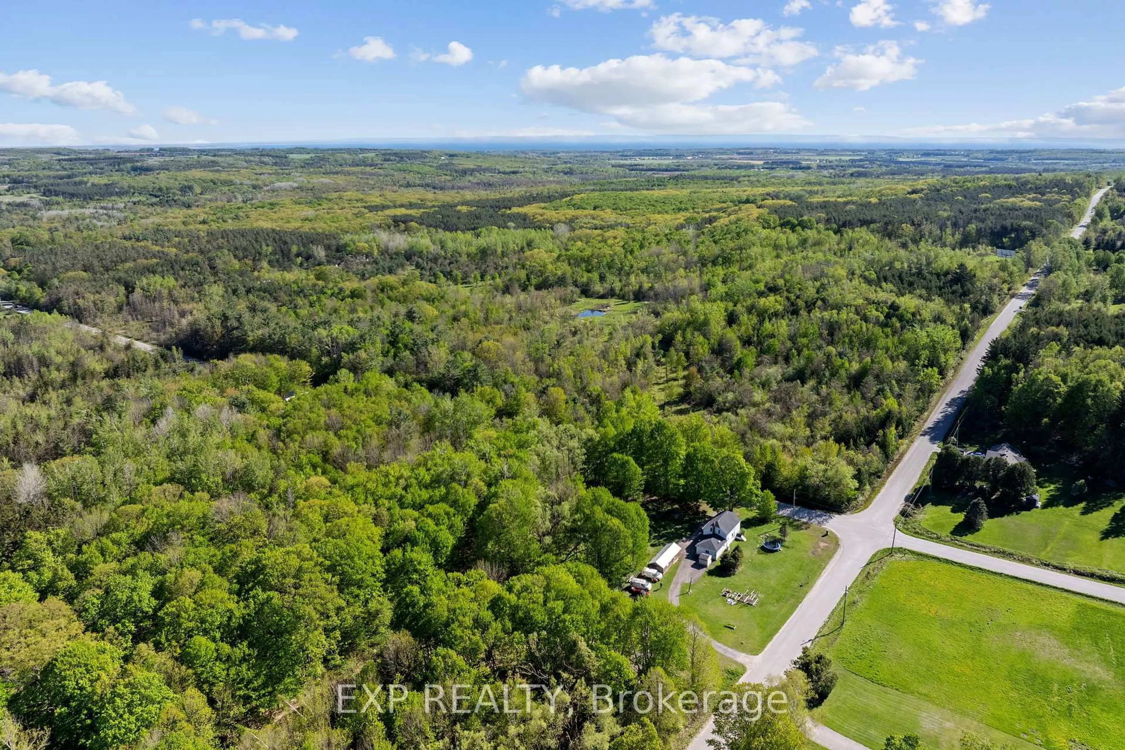 A pic from outside/outdoor area/front of a property/back of a property/a pic from drone, forest/trees view for 1433 Methodist Point Rd, Tiny Ontario L9M 0S6