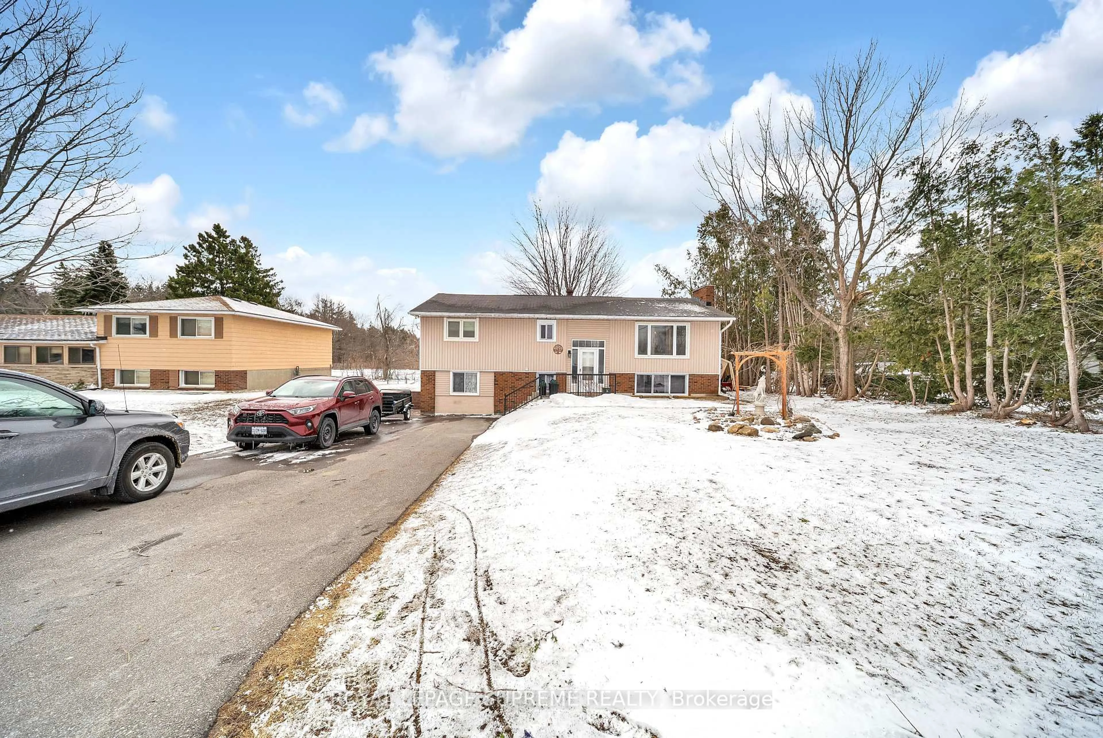A pic from outside/outdoor area/front of a property/back of a property/a pic from drone, street for 8740 12 Highway, Oro-Medonte Ontario L3V 6H2