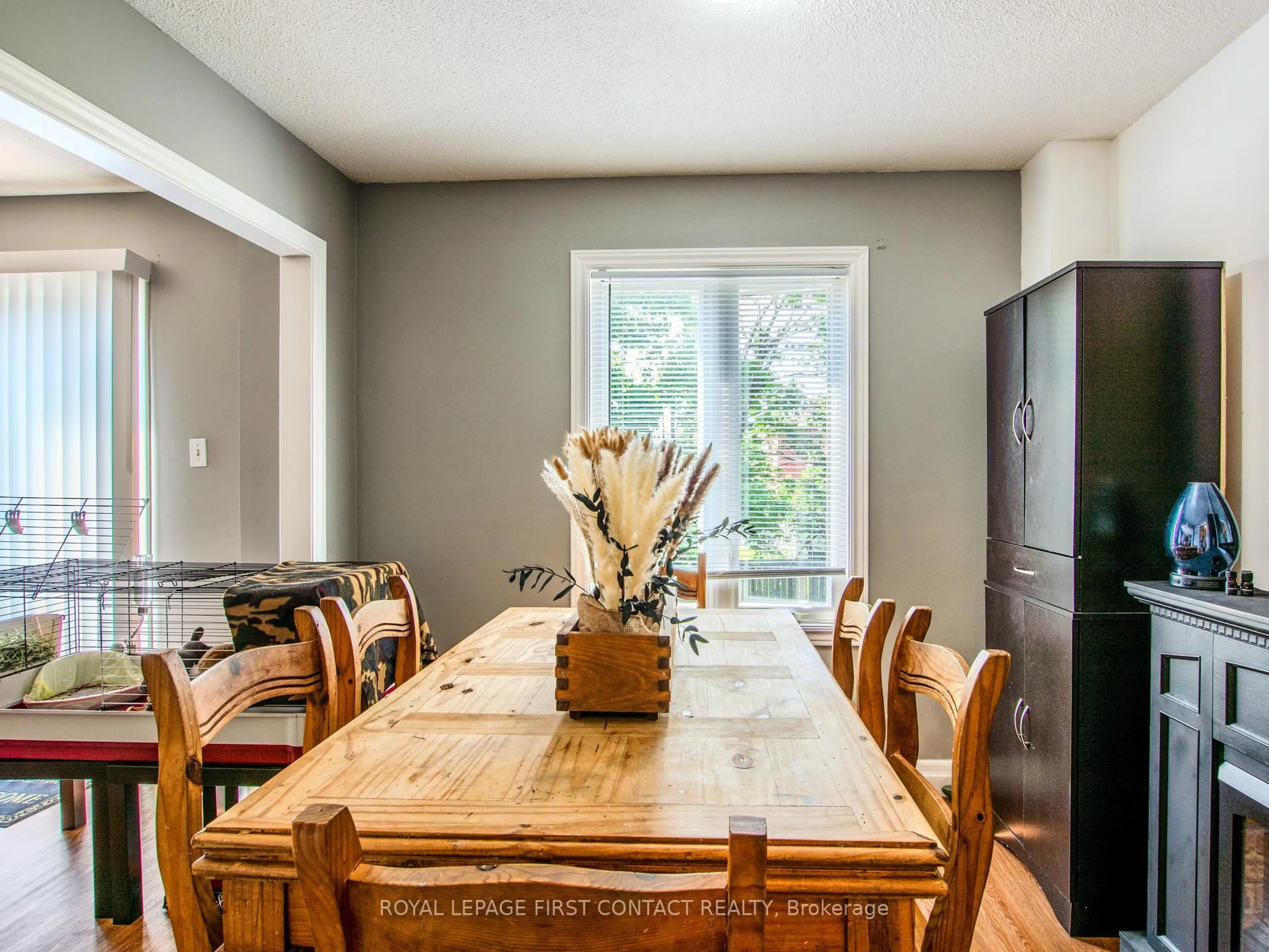 Dining room, wood/laminate floor for 102 Ferguson Dr, Barrie Ontario L4N 7E5