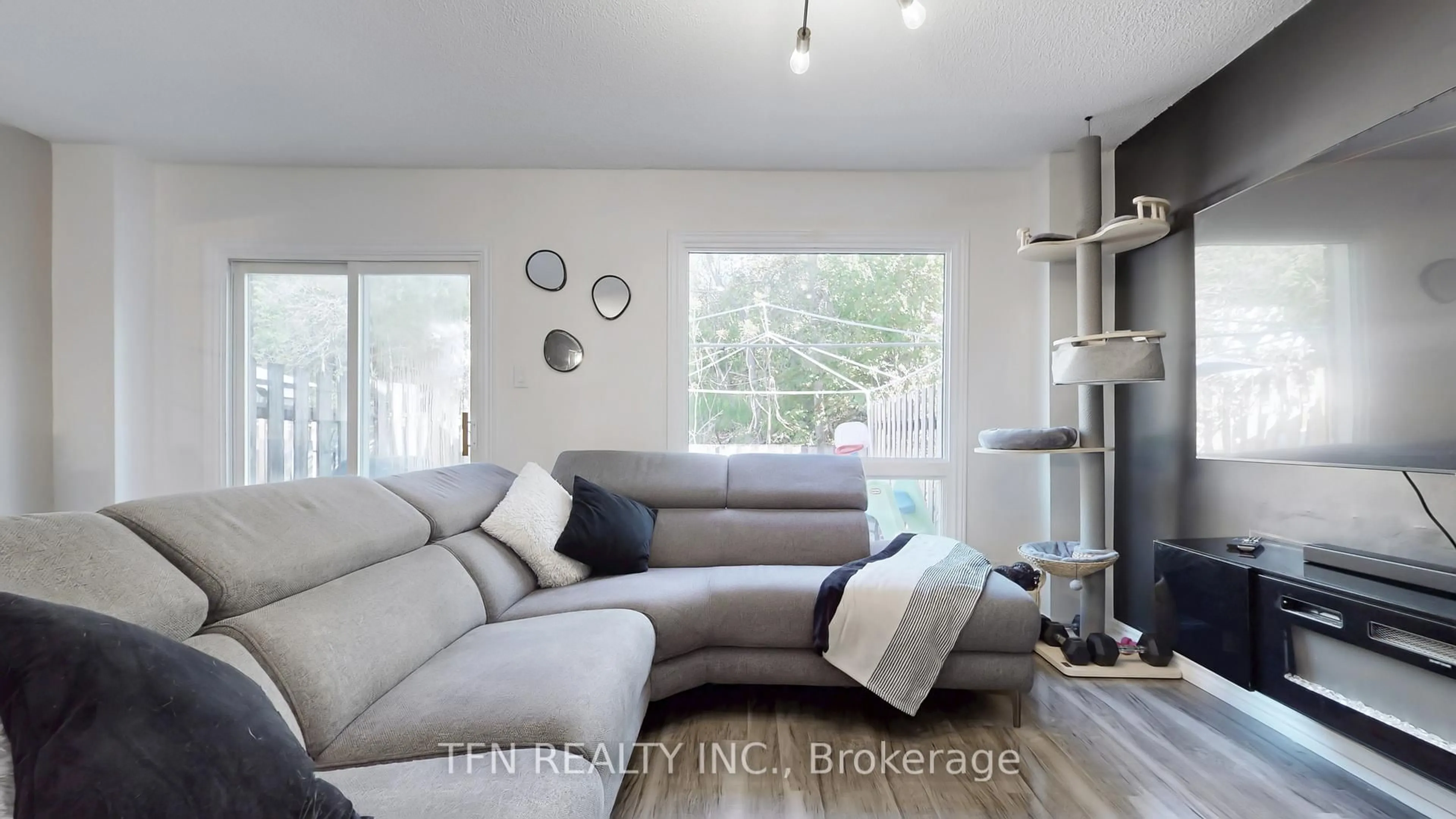 Living room with furniture, unknown for 52 Adelaide St #32, Barrie Ontario L4N 3T5