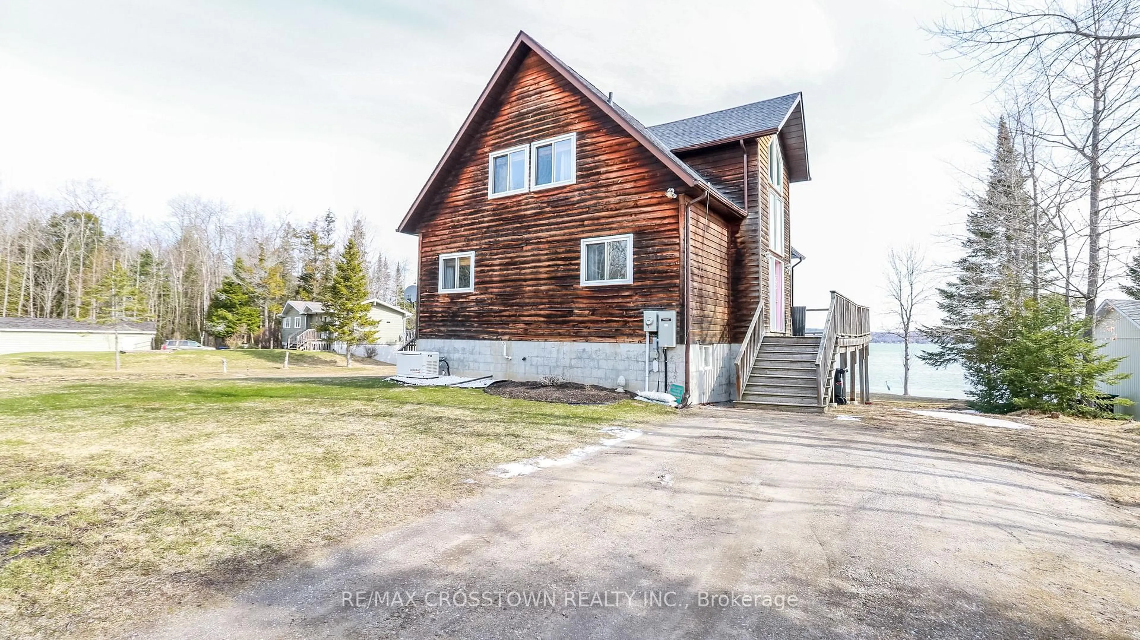 A pic from outside/outdoor area/front of a property/back of a property/a pic from drone, building for 3093 Sandy Bend, Springwater Ontario L0L 1P0