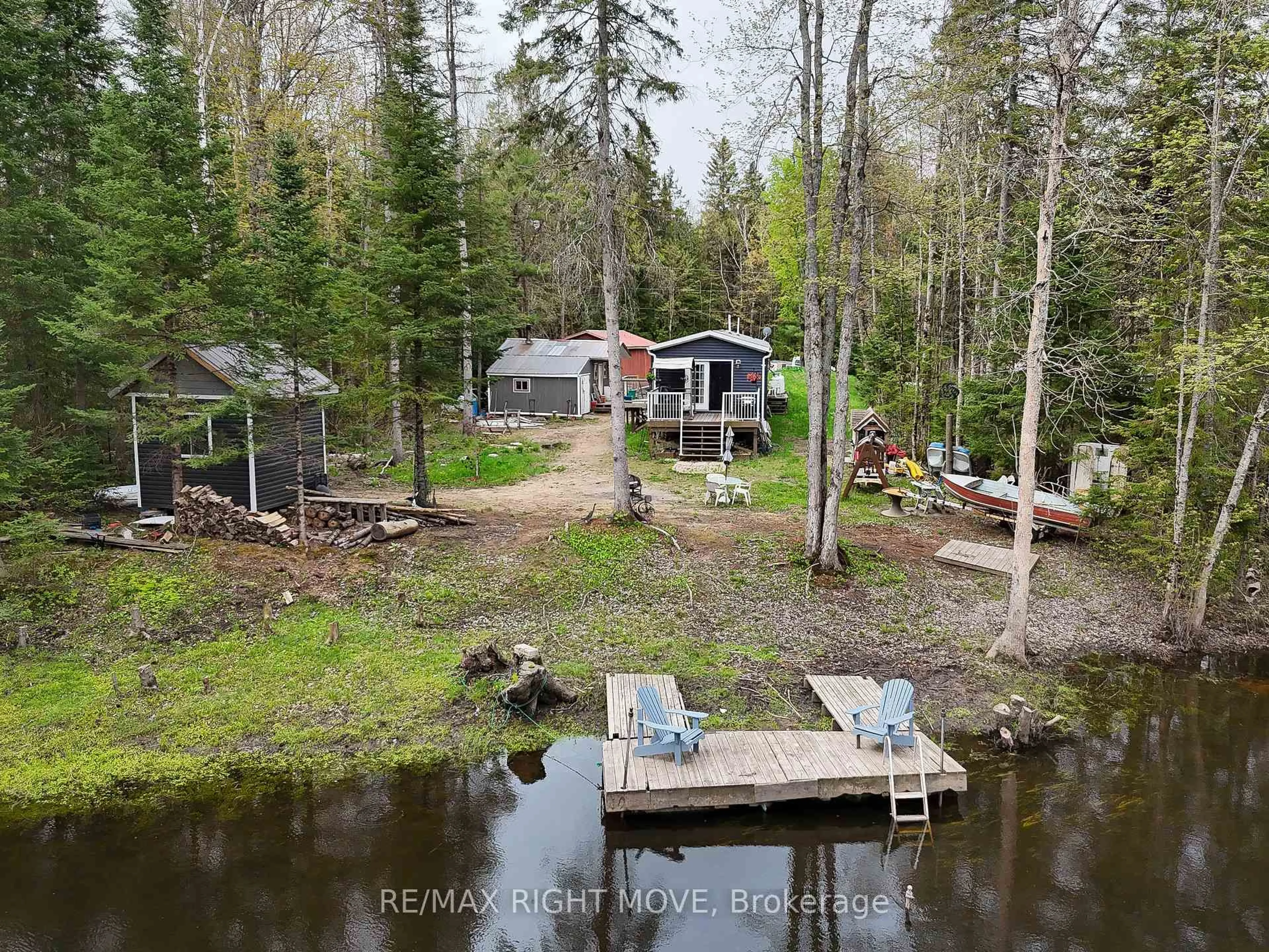 A pic from outside/outdoor area/front of a property/back of a property/a pic from drone, water/lake/river/ocean view for 6593 Pioneer Village Lane, Ramara Ontario L0K 1W0