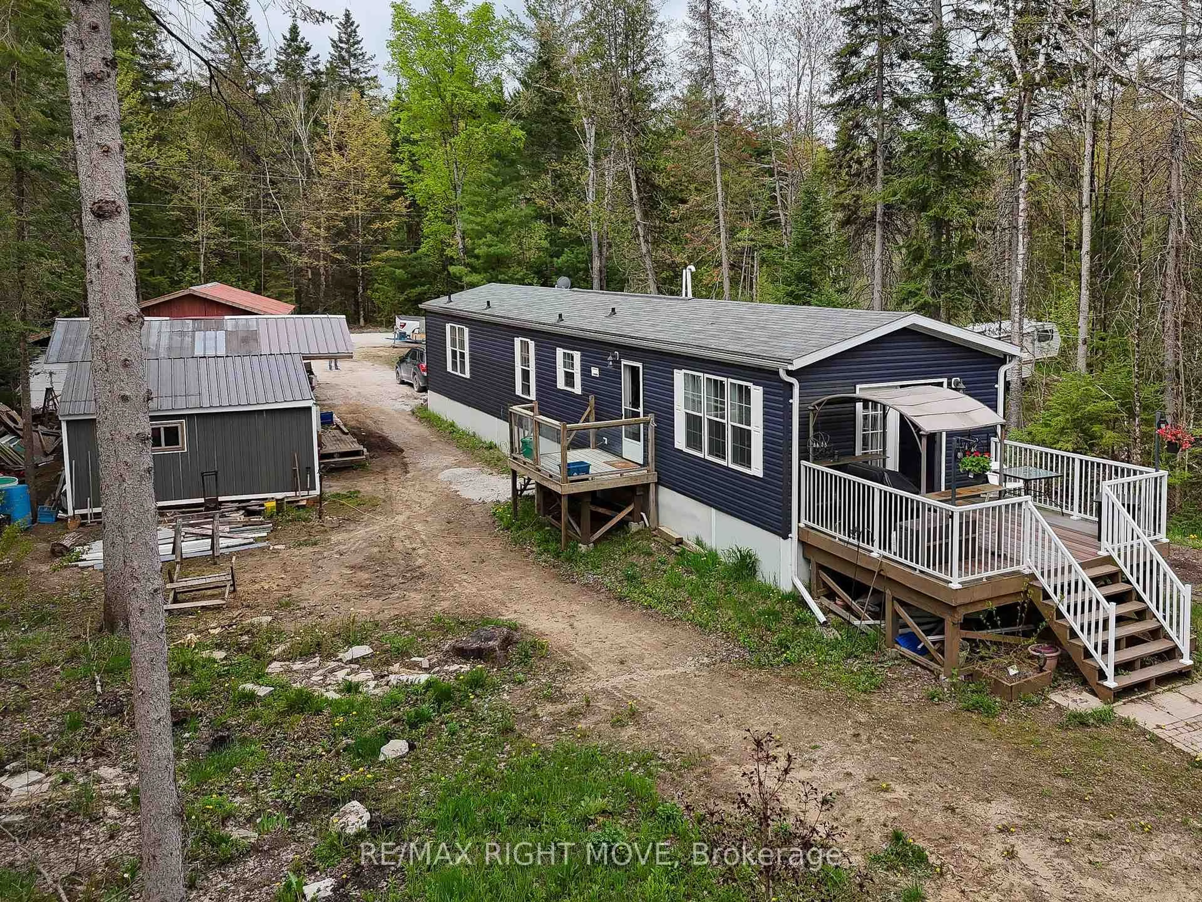 A pic from outside/outdoor area/front of a property/back of a property/a pic from drone, unknown for 6593 Pioneer Village Lane, Ramara Ontario L0K 1W0