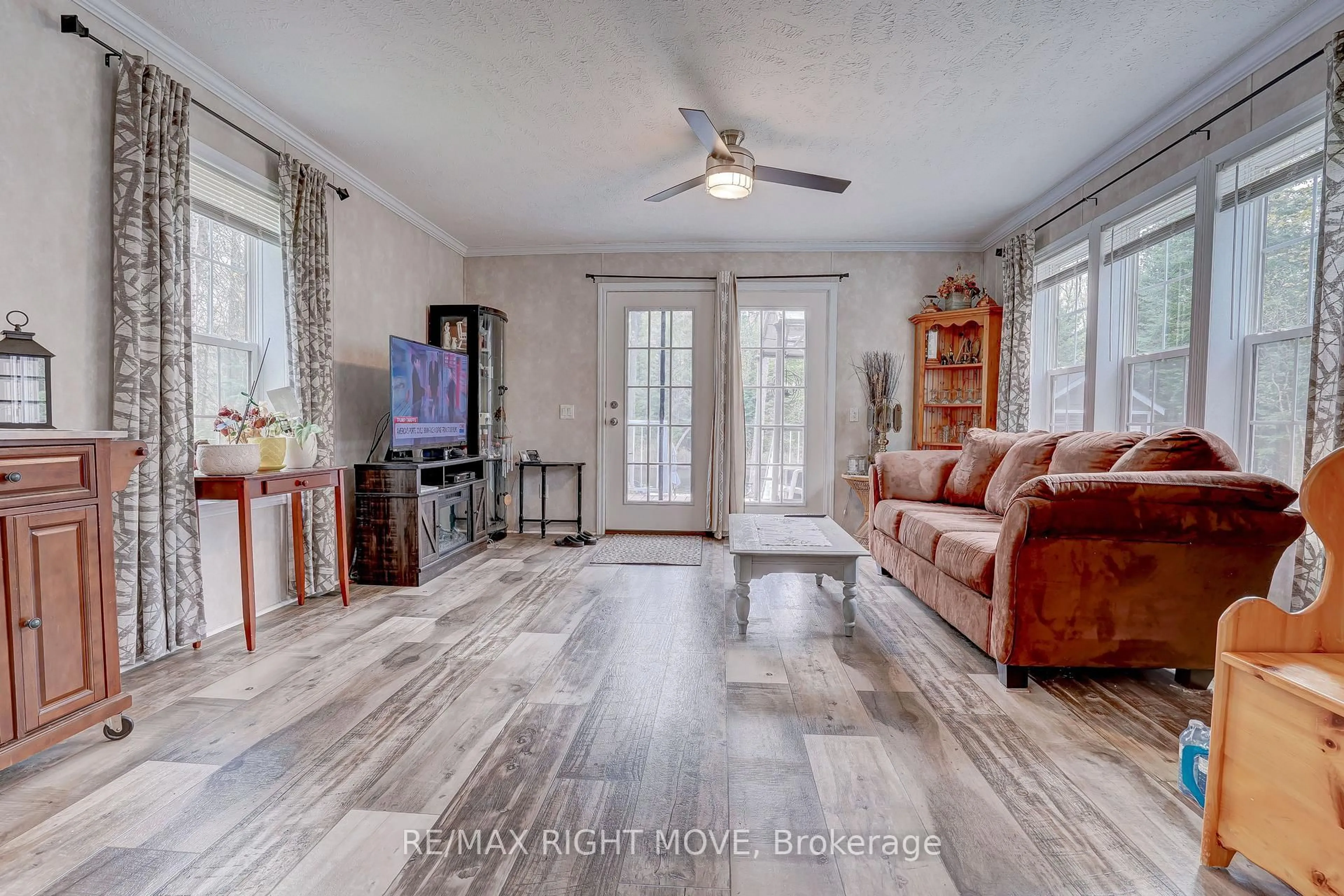 Living room with furniture, unknown for 6593 Pioneer Village Lane, Ramara Ontario L0K 1W0