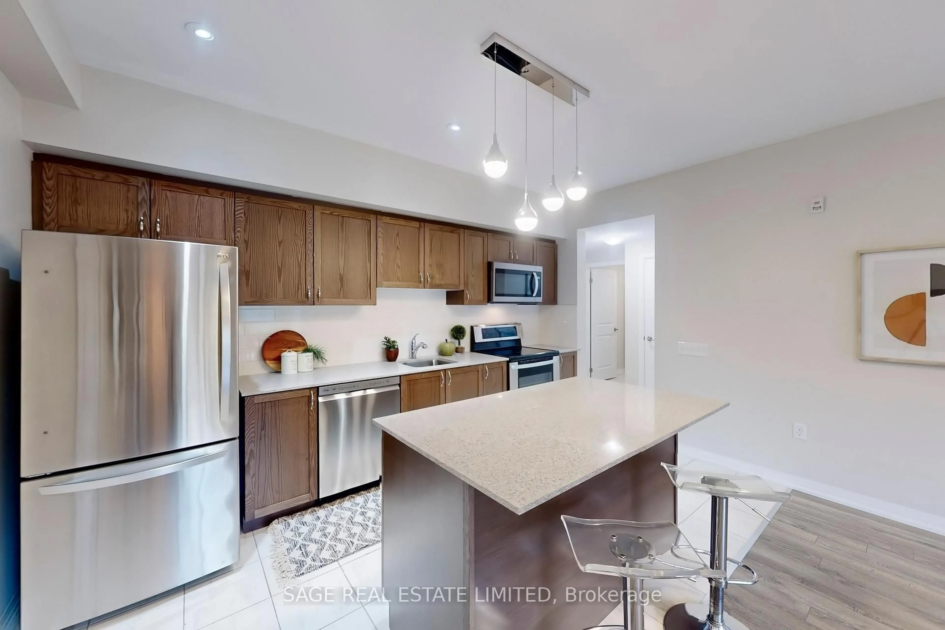 Open concept kitchen, ceramic/tile floor for 300 Essa Rd #310, Barrie Ontario L9J 0B9