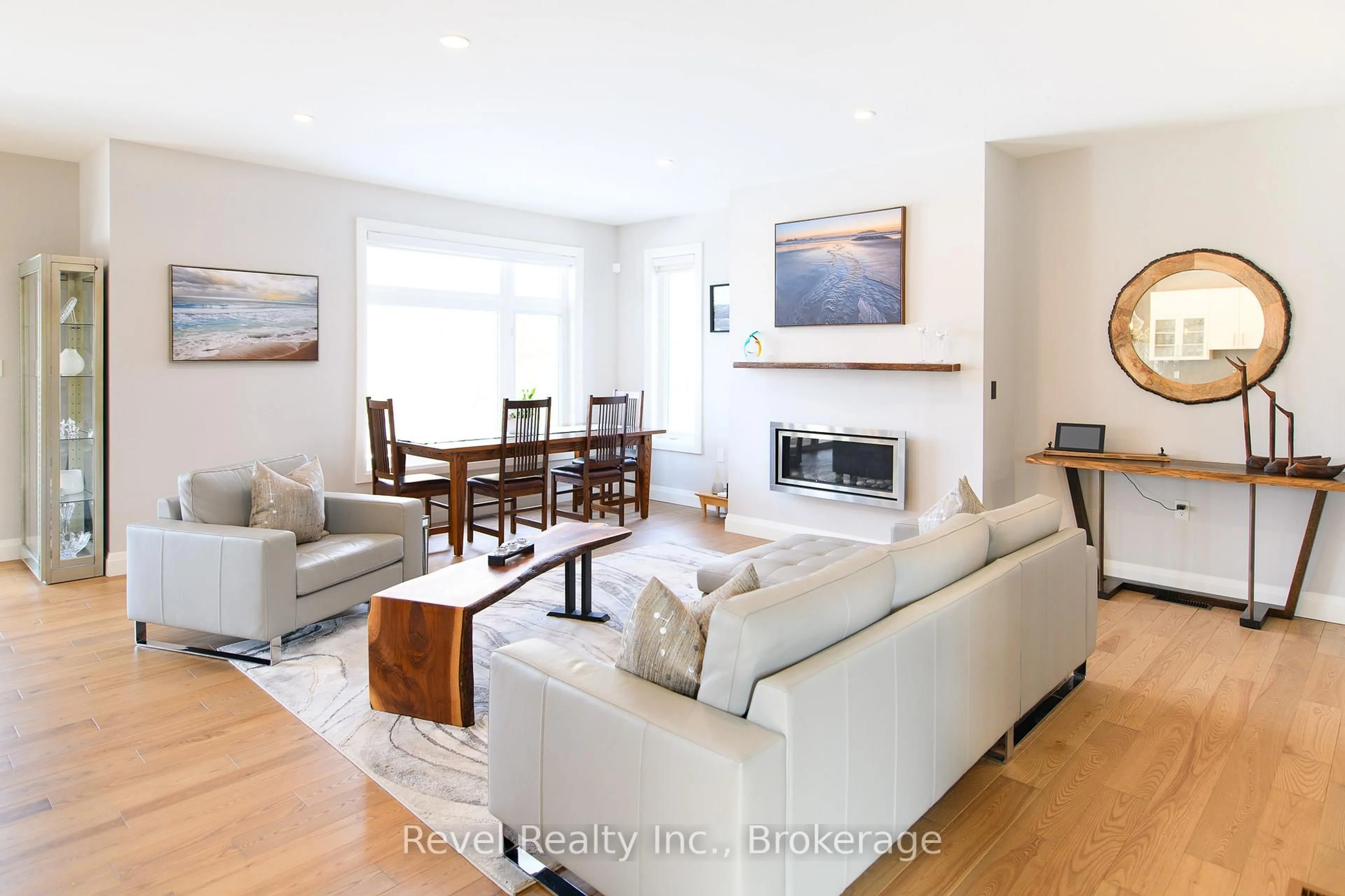 Living room with furniture, wood/laminate floor for 1911 Shore Lane, Wasaga Beach Ontario L9Z 1T8