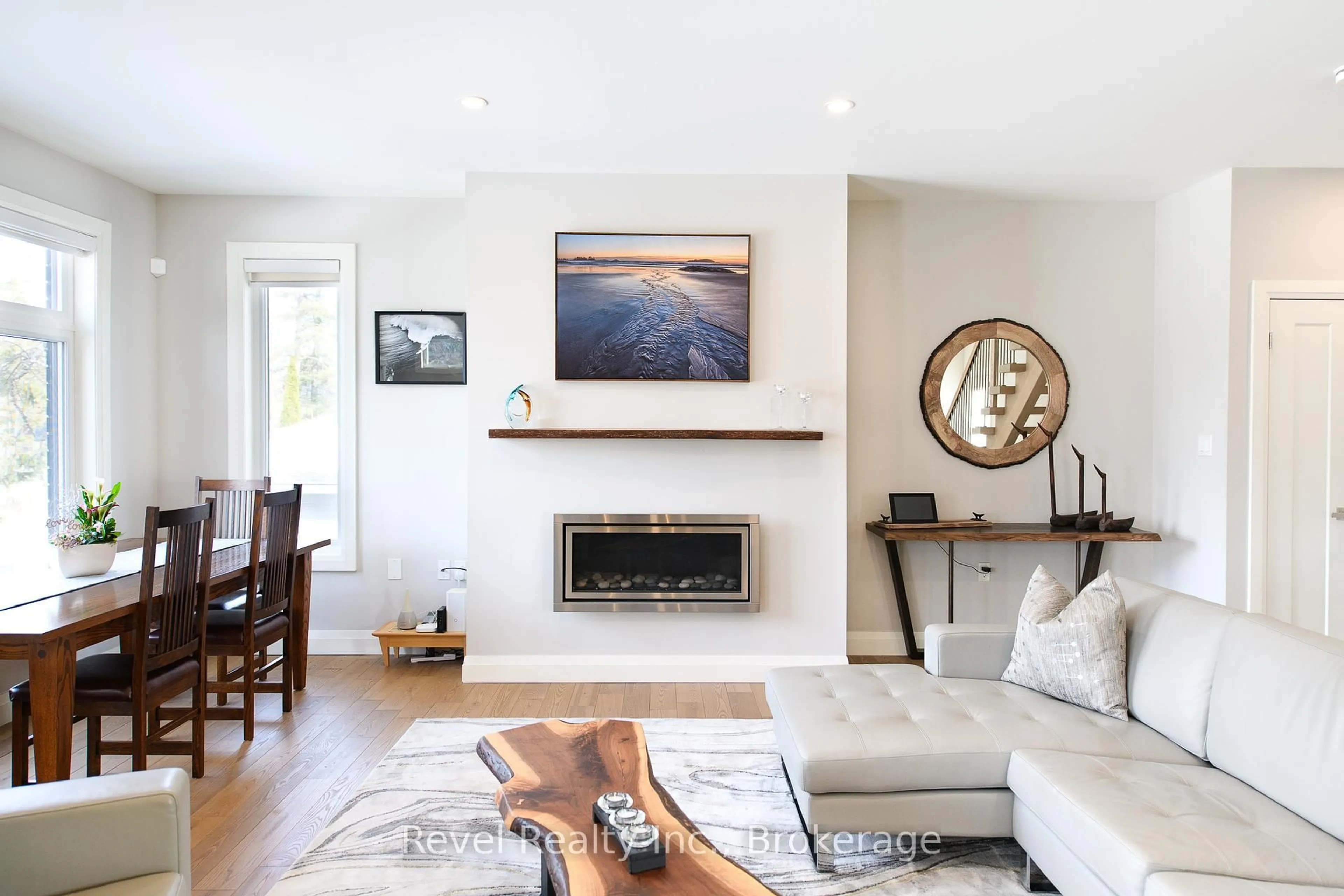 Living room with furniture, wood/laminate floor for 1911 Shore Lane, Wasaga Beach Ontario L9Z 1T8