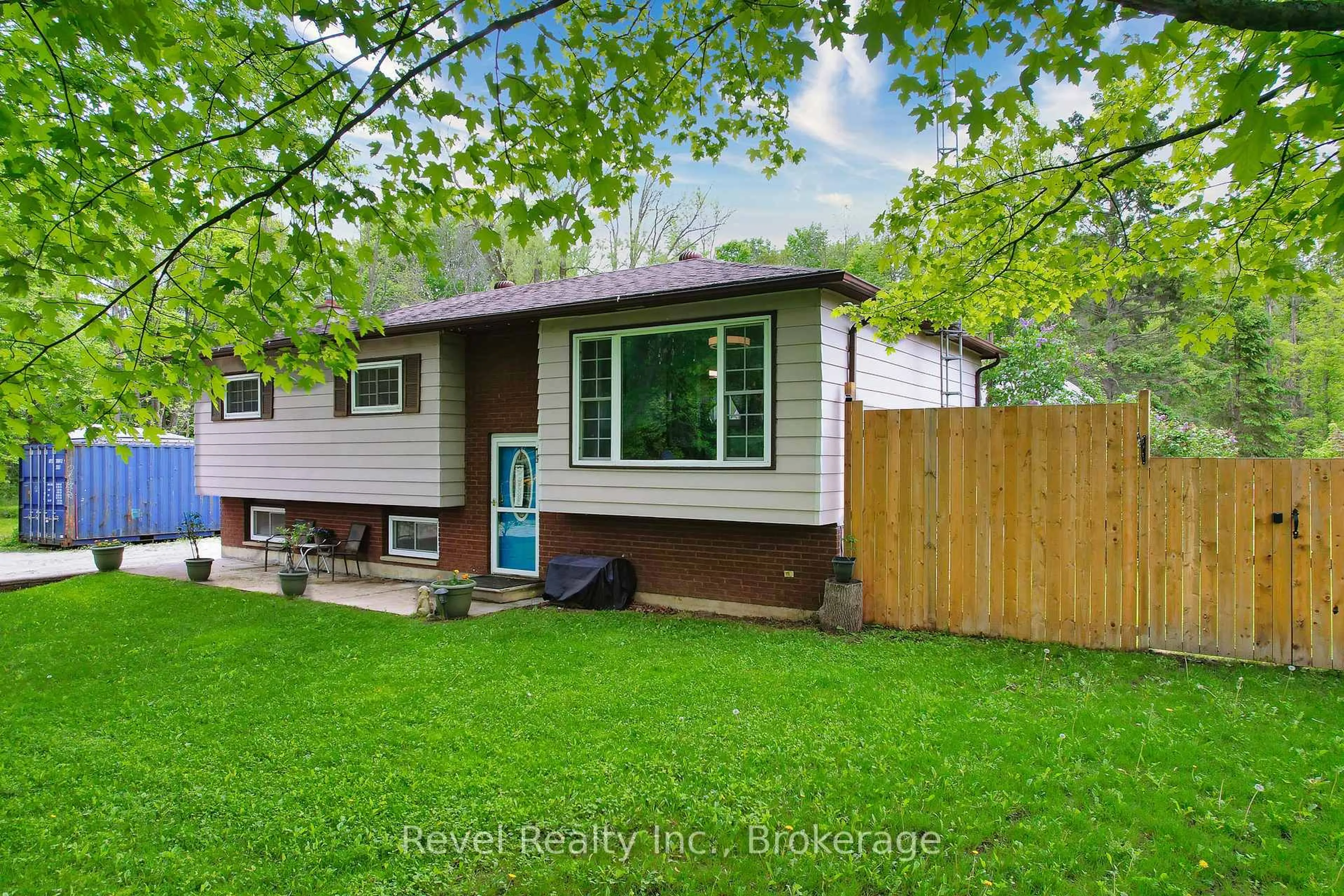 Home with vinyl exterior material, street for 11 Innisfree Dr, Springwater Ontario L0L 2K0