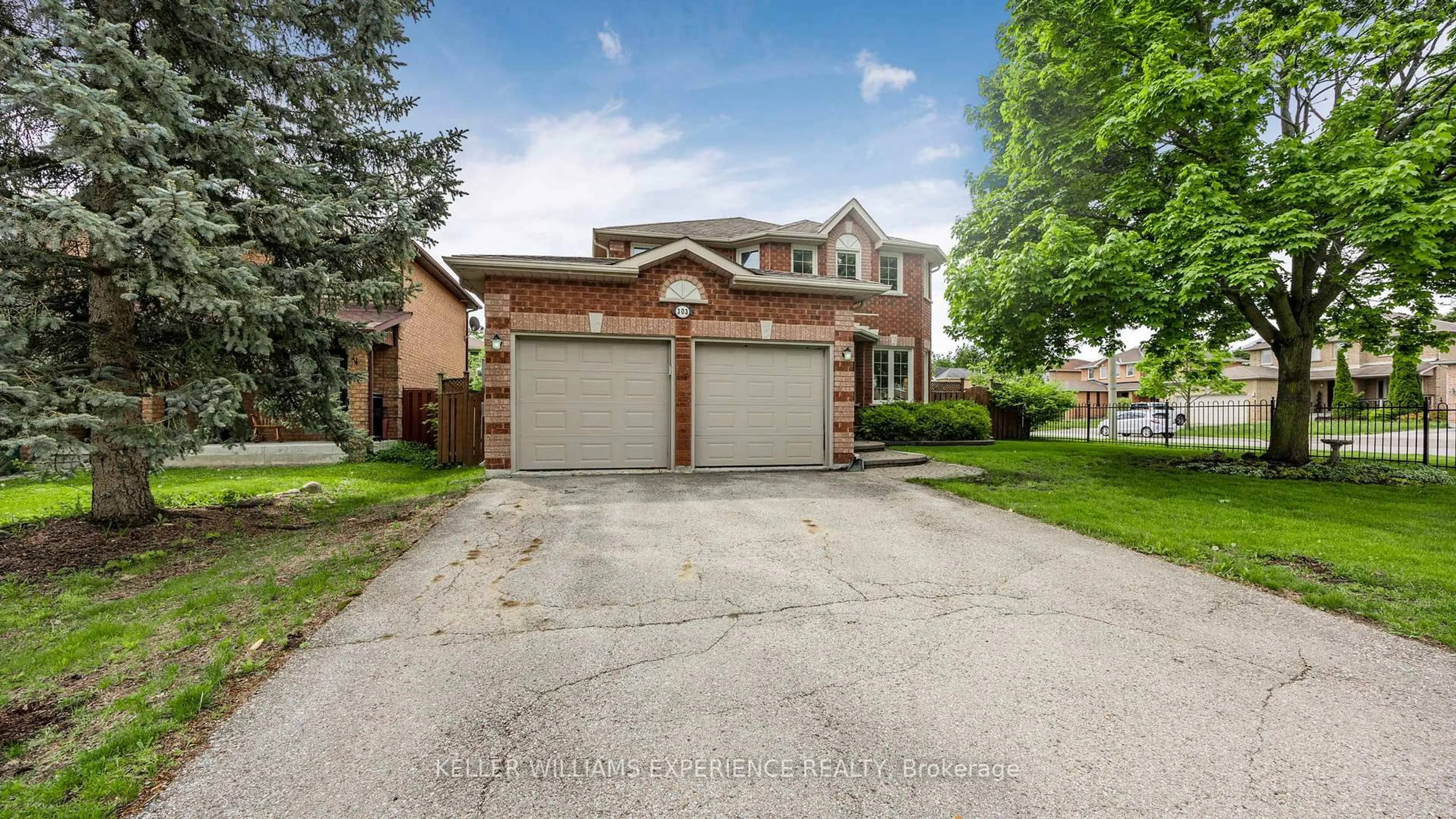 Home with brick exterior material, street for 303 Livingstone St, Barrie Ontario L4N 7C2