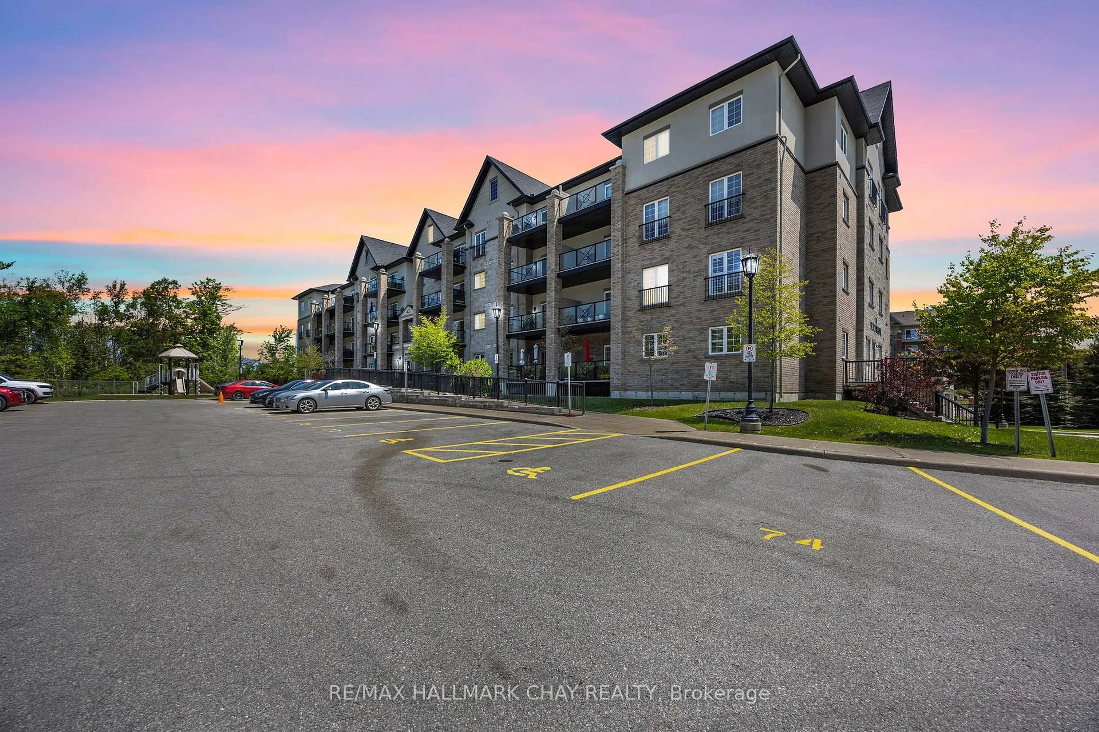 A pic from outside/outdoor area/front of a property/back of a property/a pic from drone, unknown for 40 Ferndale Dr #407, Barrie Ontario L4N 2L3