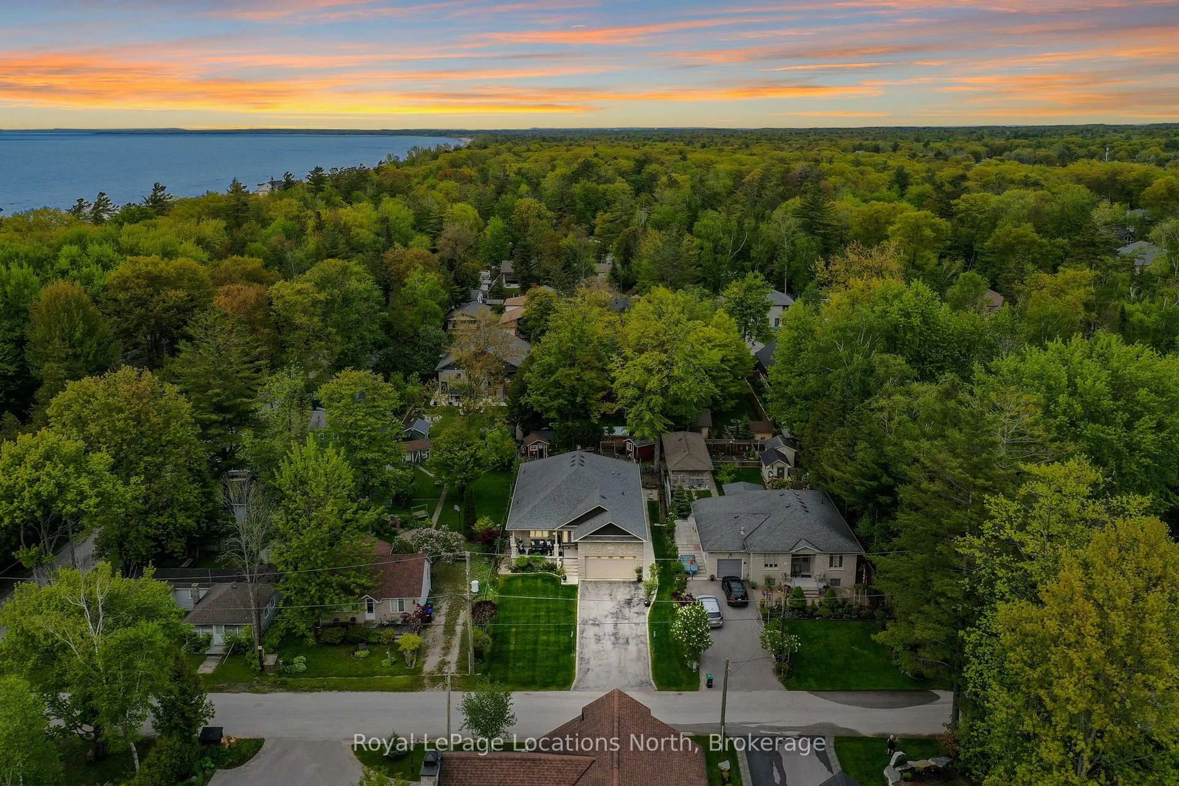 A pic from outside/outdoor area/front of a property/back of a property/a pic from drone, water/lake/river/ocean view for 55 34th St, Wasaga Beach Ontario L9Z 2C2