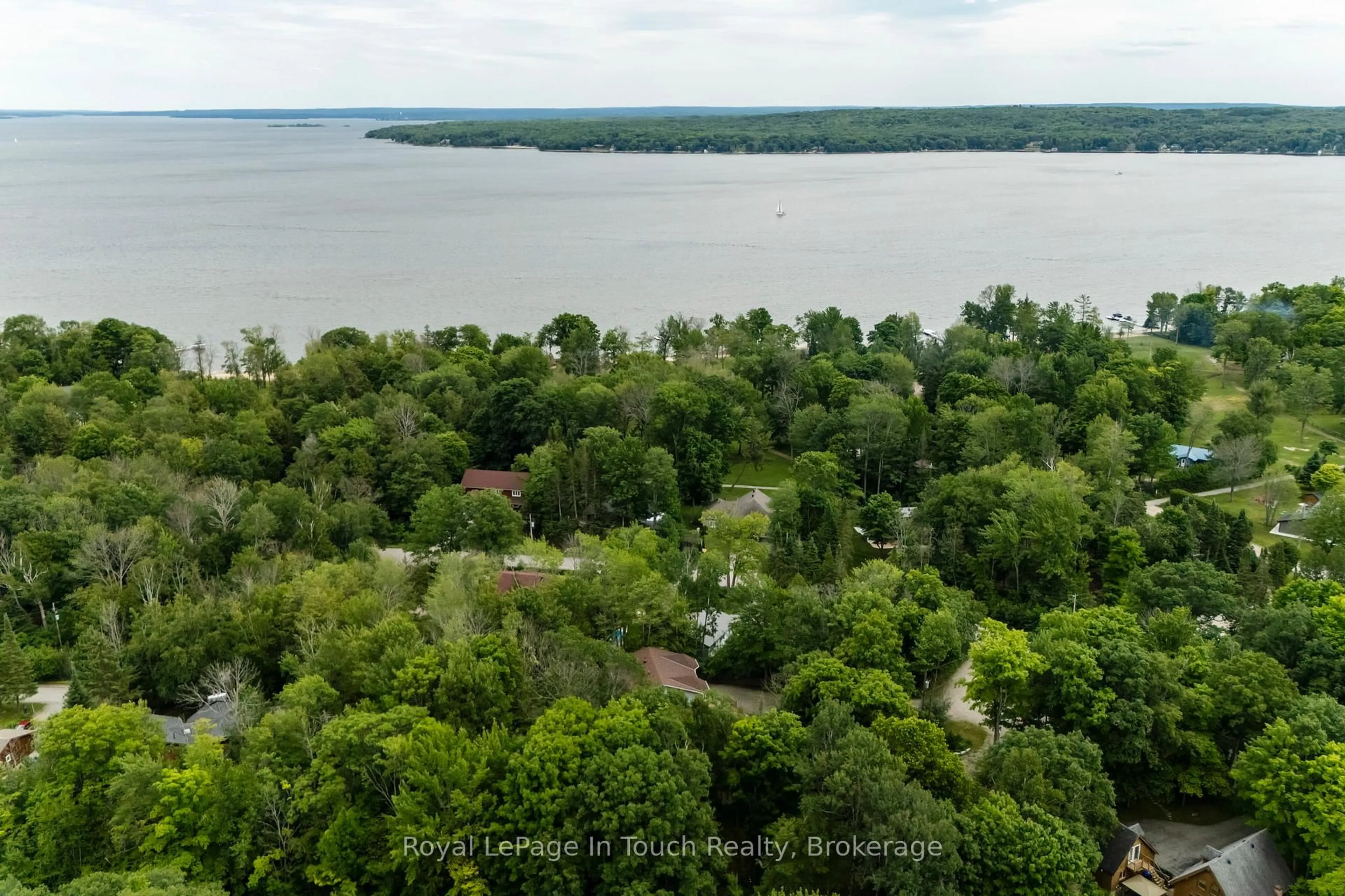 A pic from outside/outdoor area/front of a property/back of a property/a pic from drone, water/lake/river/ocean view for 66 Joliet Cres, Tiny Ontario L9M 0G3