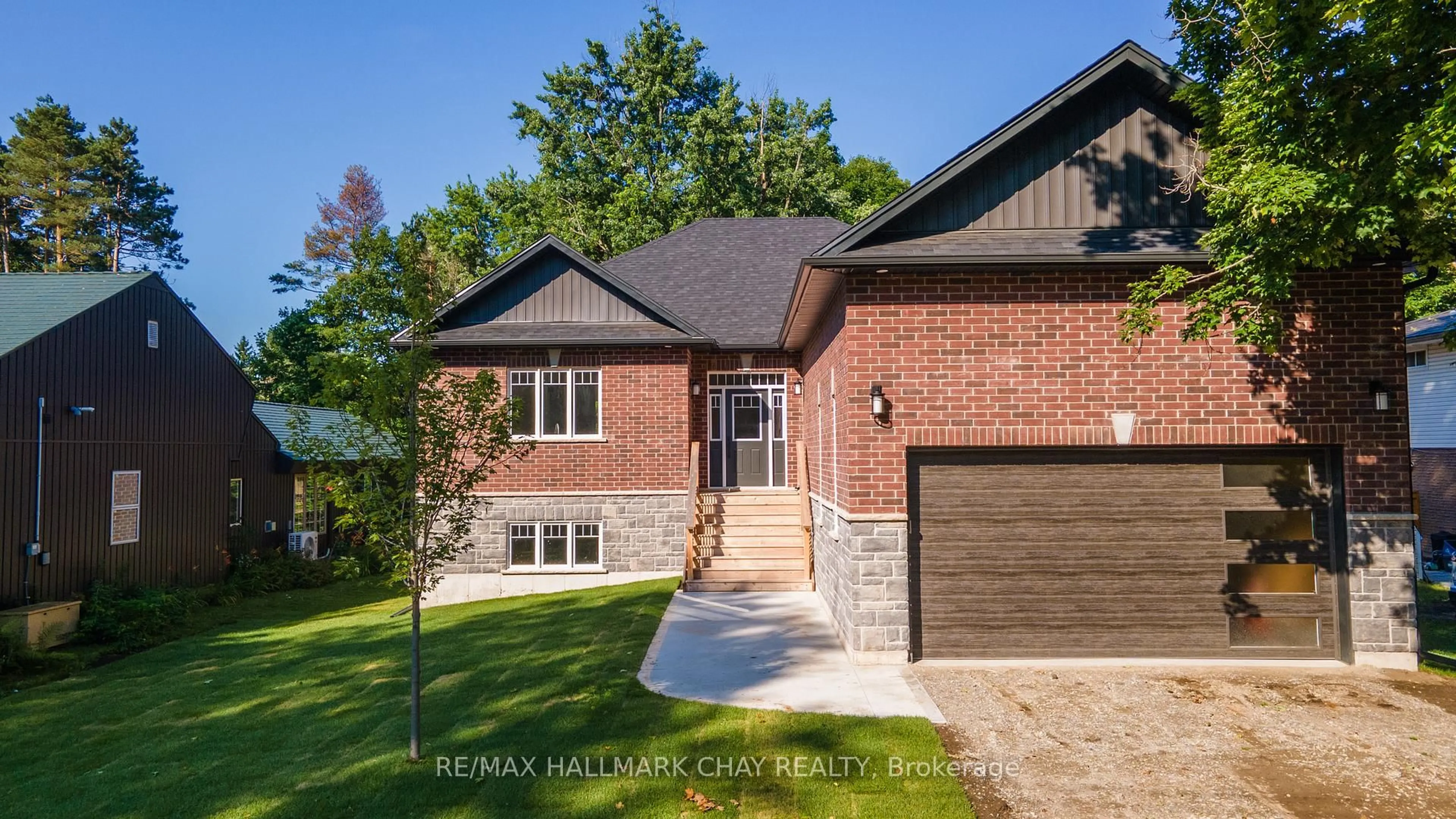 Home with brick exterior material, street for 8 Alexander St, Springwater Ontario L3V 3T8