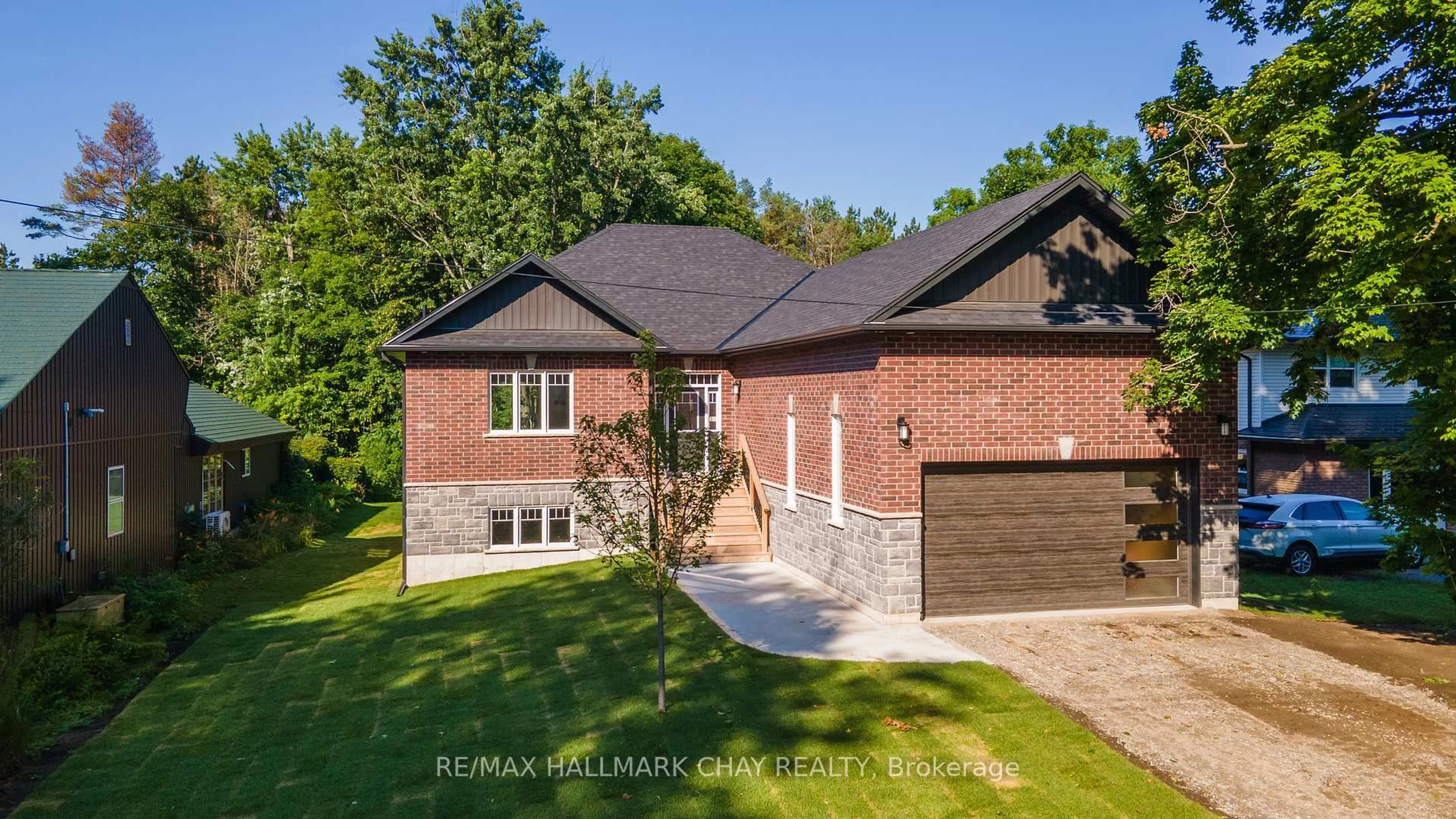 Home with brick exterior material, street for 8 Alexander St, Springwater Ontario L3V 3T8