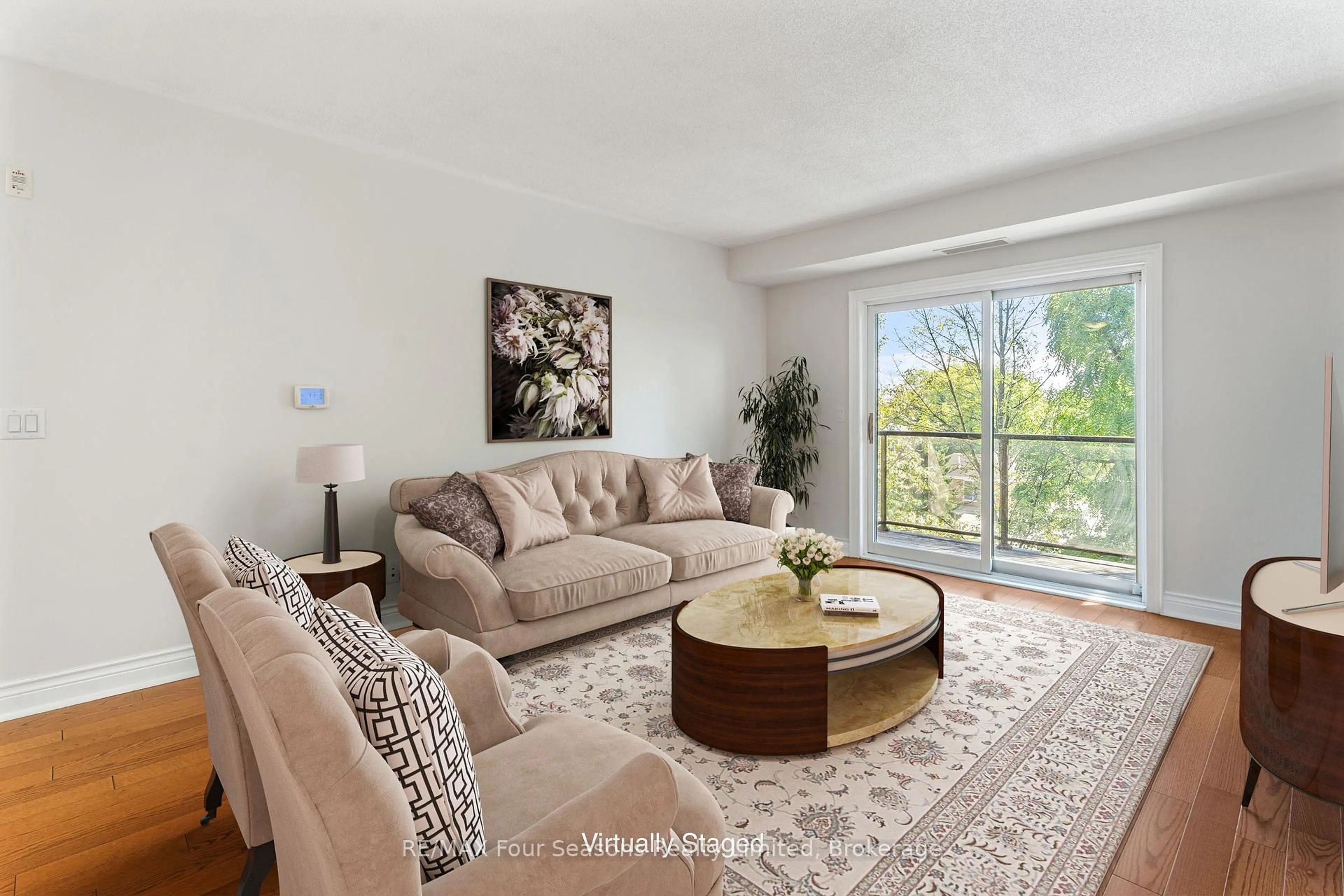 Living room with furniture, unknown for 91 RAGLAN St #411, Collingwood Ontario L9Y 3B3