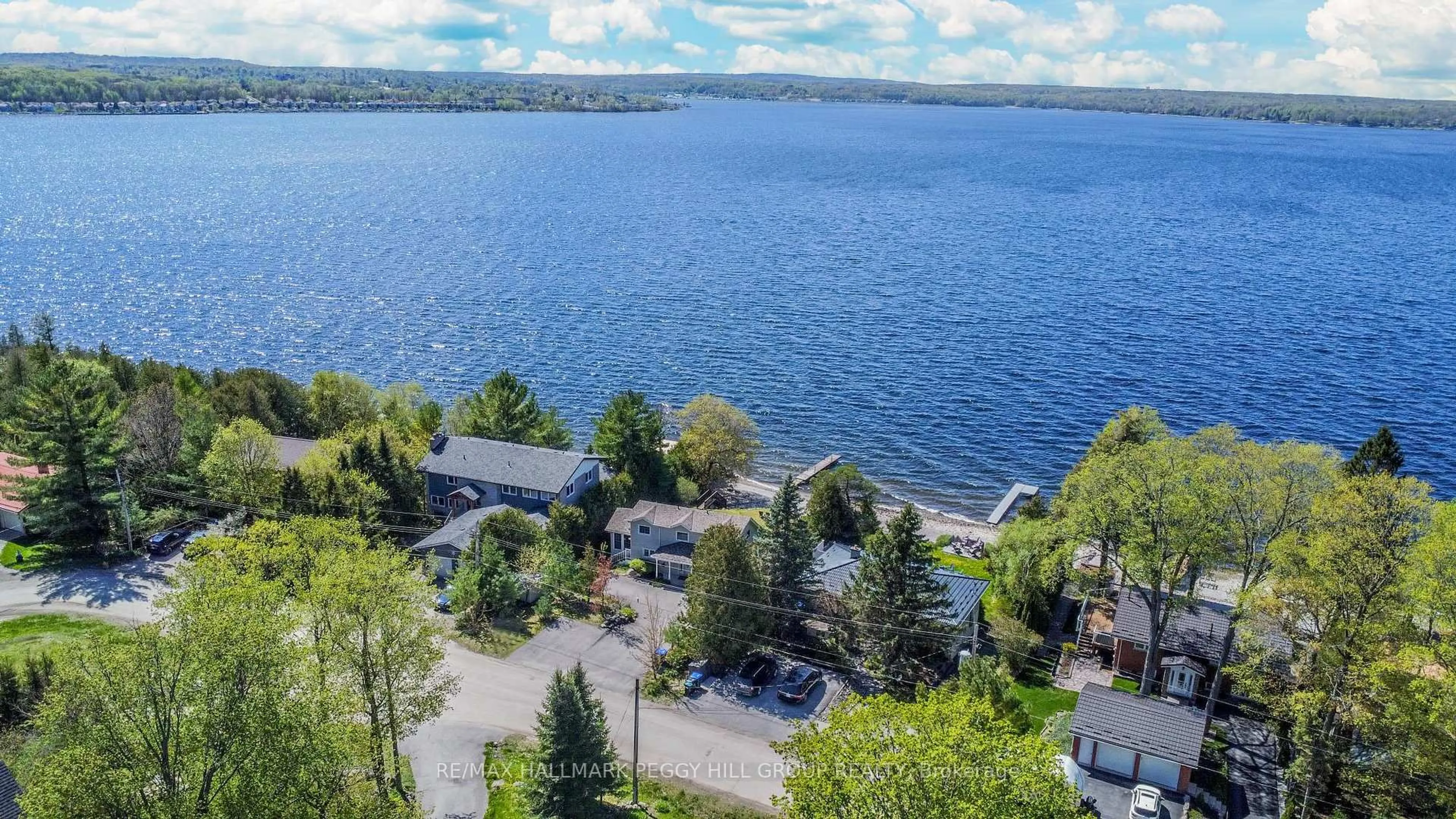 A pic from outside/outdoor area/front of a property/back of a property/a pic from drone, water/lake/river/ocean view for 30 Georgian Lane, Tay Ontario L0K 1R0