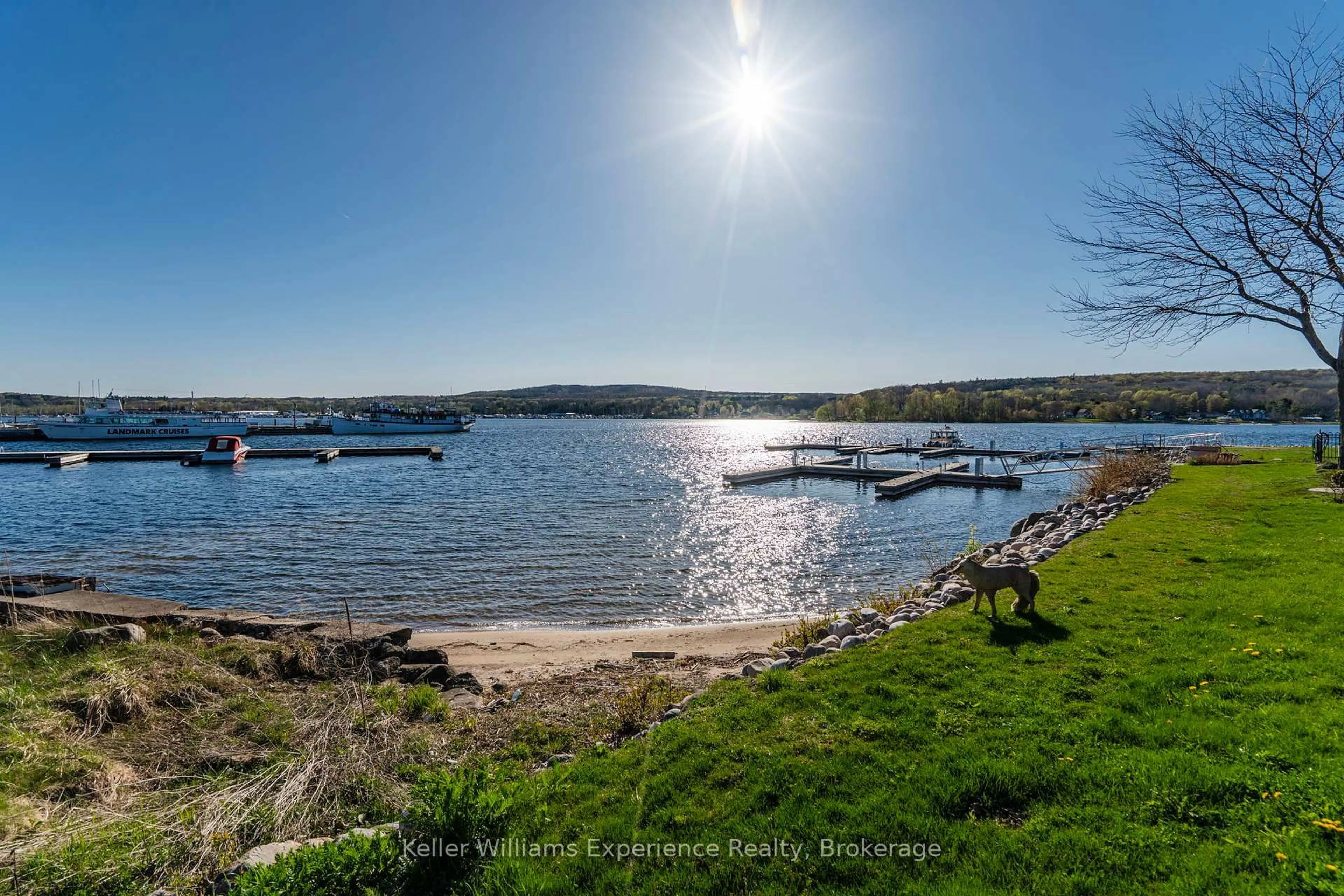 A pic from outside/outdoor area/front of a property/back of a property/a pic from drone, water/lake/river/ocean view for 4 Beck Blvd #4, Penetanguishene Ontario L9M 2H3
