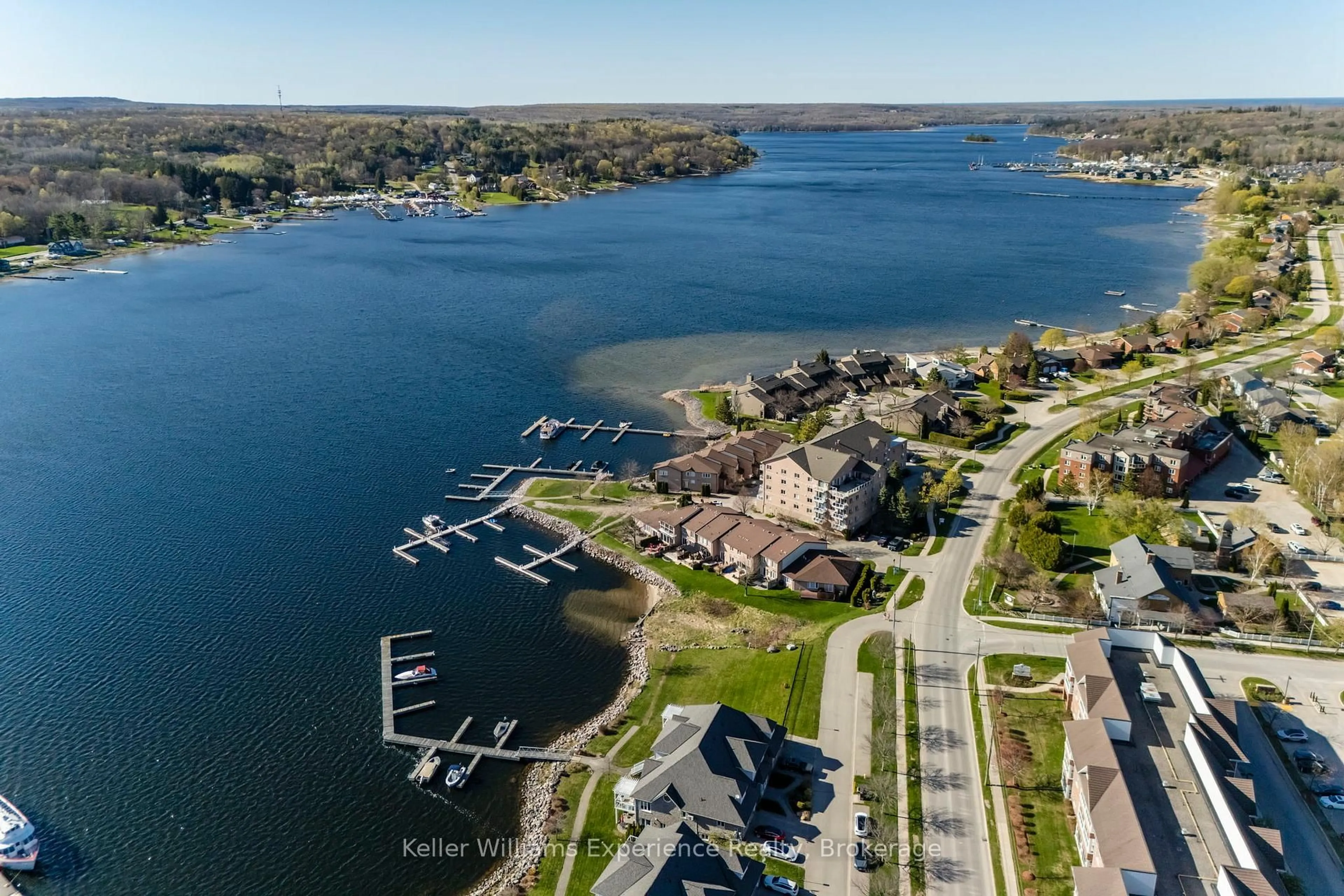 A pic from outside/outdoor area/front of a property/back of a property/a pic from drone, water/lake/river/ocean view for 4 Beck Blvd #4, Penetanguishene Ontario L9M 2H3