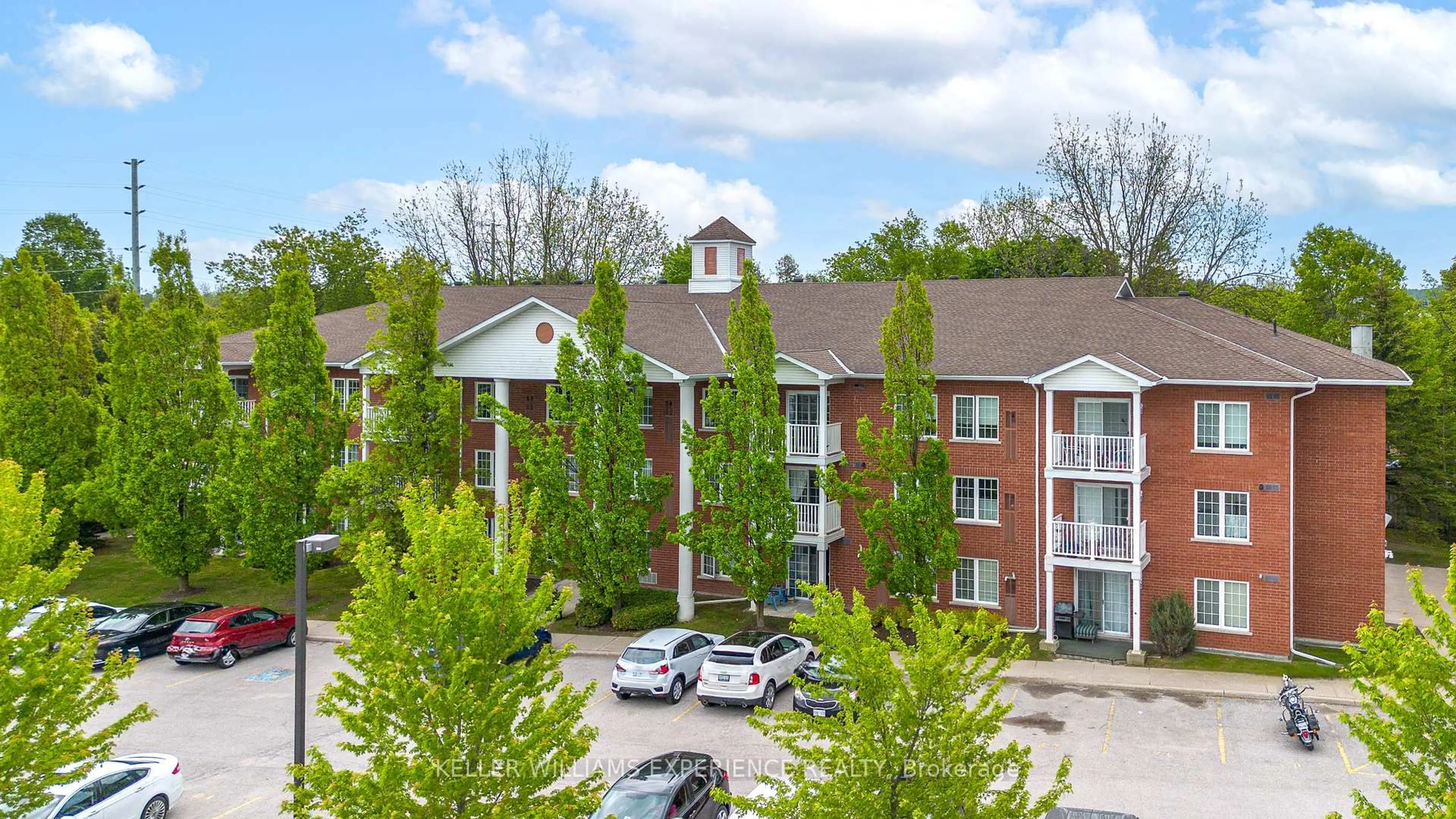 A pic from outside/outdoor area/front of a property/back of a property/a pic from drone, mountain view for 49 JACOBS Terr #210, Barrie Ontario L4N 0W4