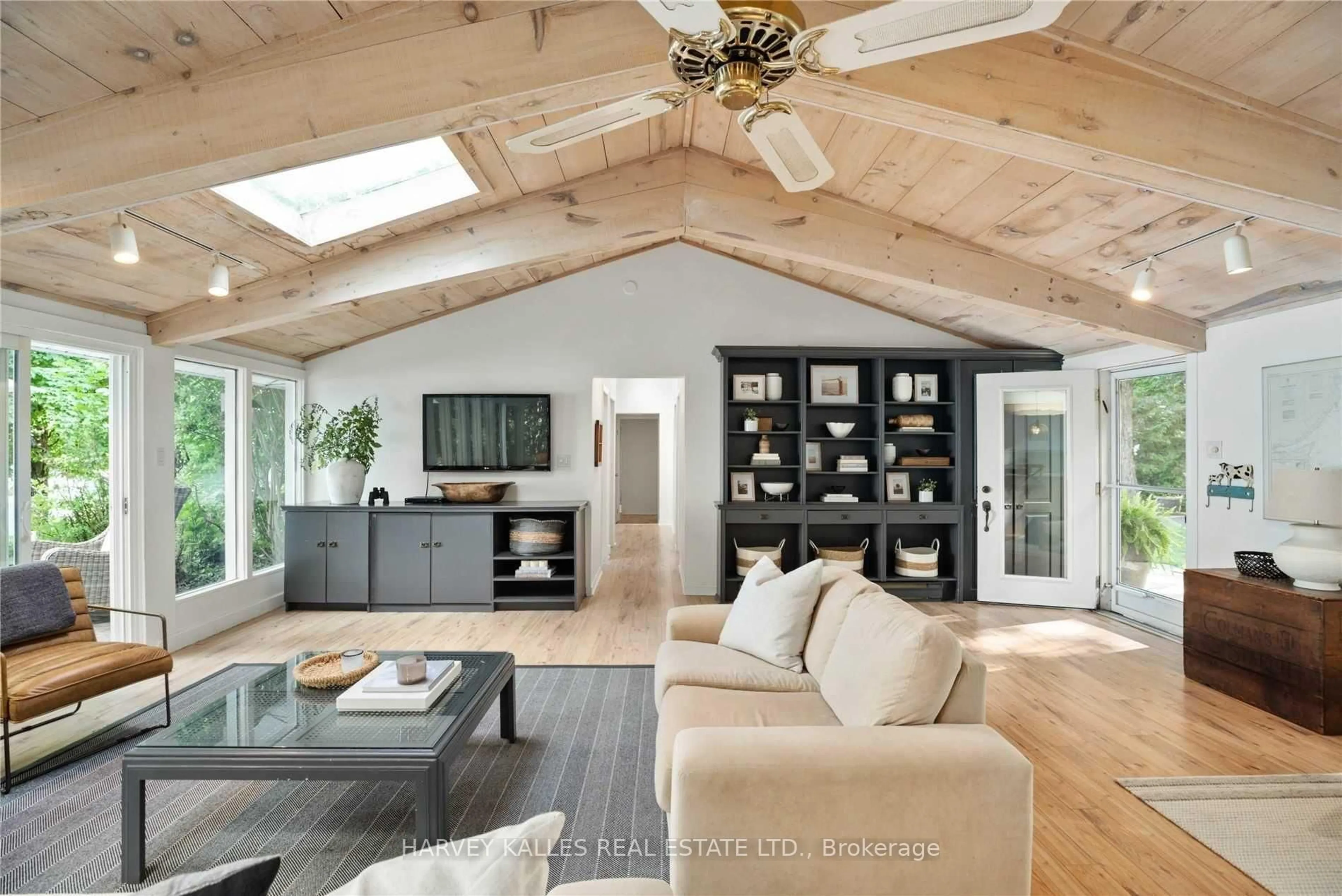 Living room with furniture, wood/laminate floor for 1 Mclean Cres, Oro-Medonte Ontario L4M 1J2