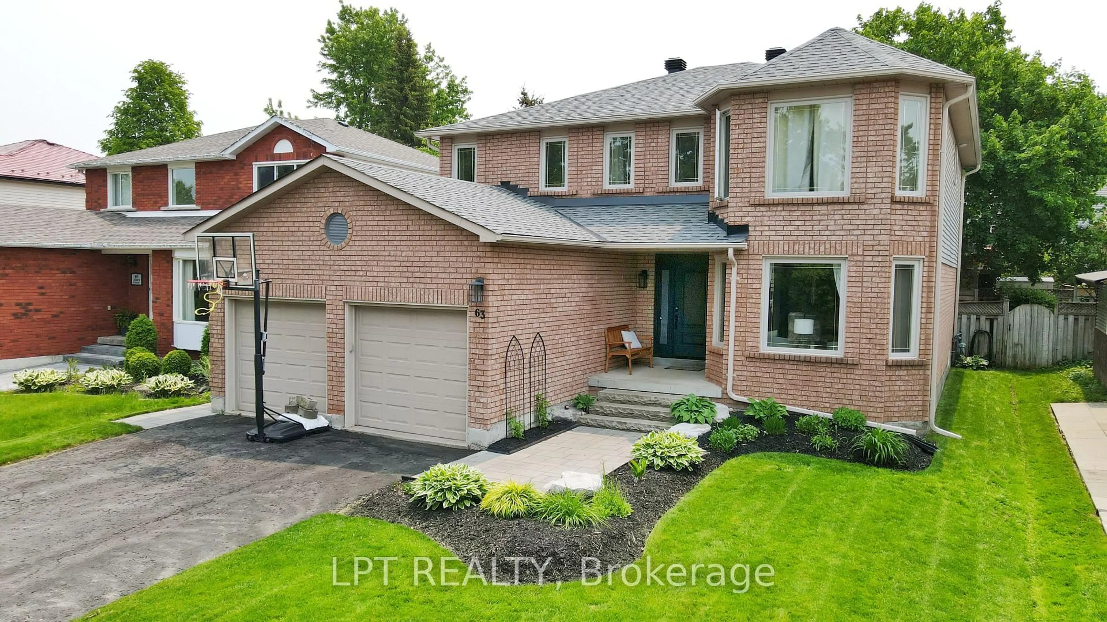 Home with brick exterior material, street for 63 James St, Barrie Ontario L4N 6Y2