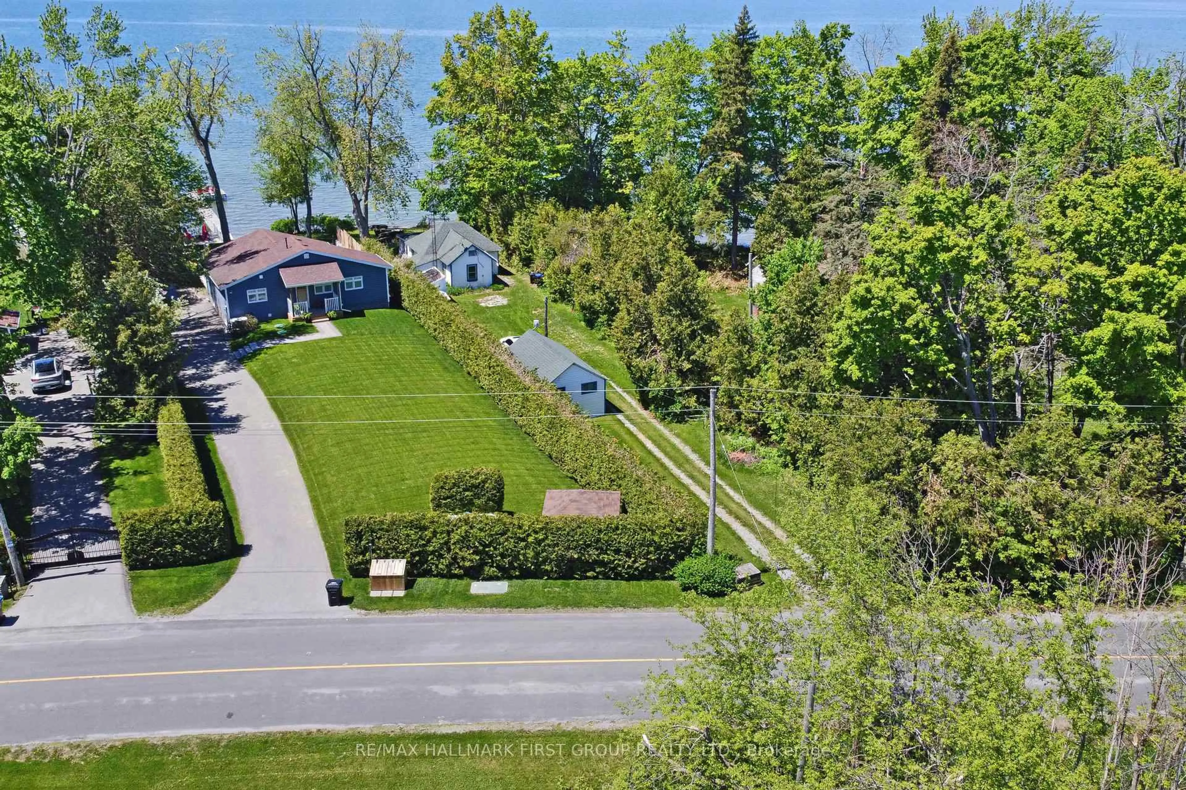 A pic from outside/outdoor area/front of a property/back of a property/a pic from drone, street for 2196 Lakeshore Dr, Ramara Ontario L0K 1B0
