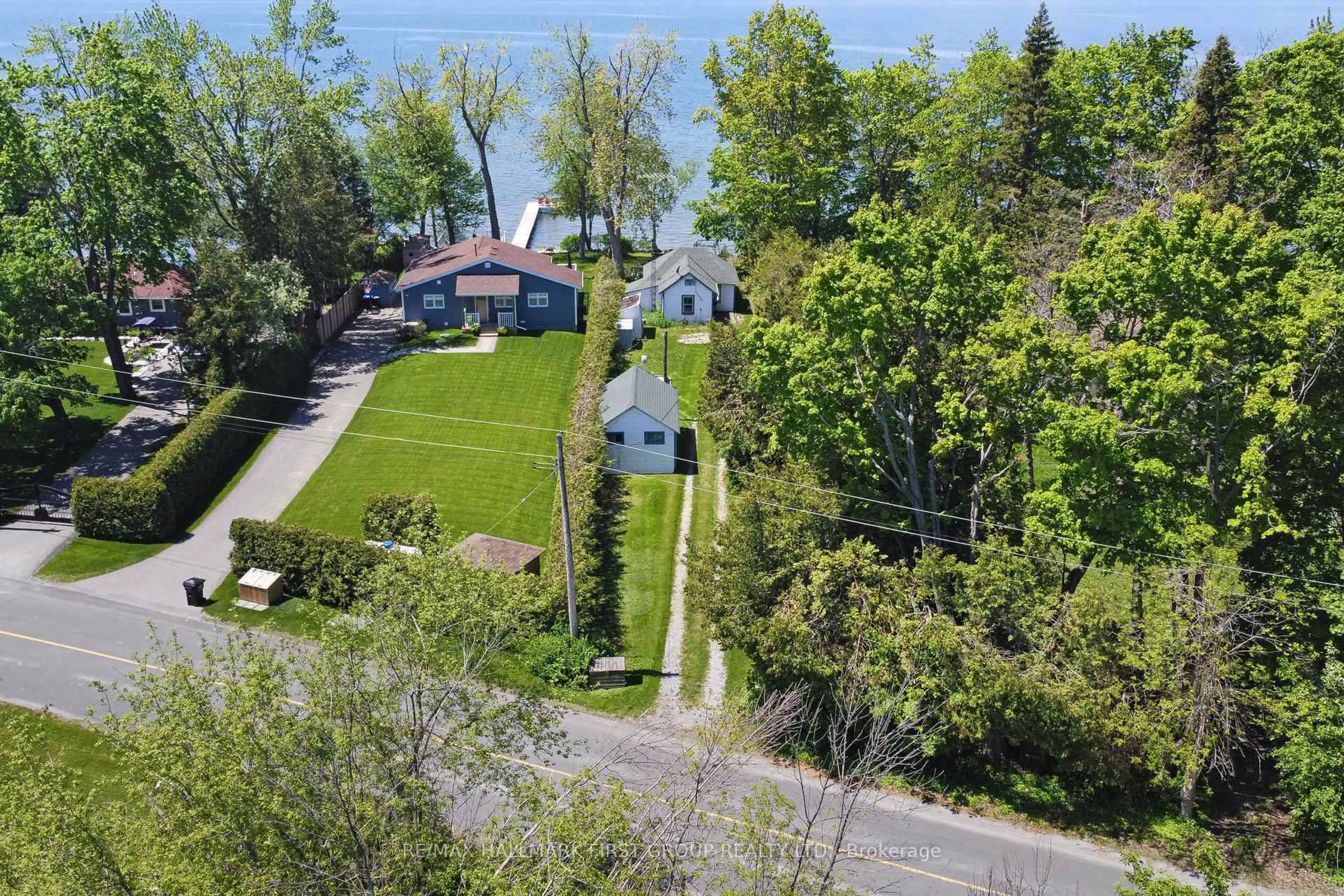 A pic from outside/outdoor area/front of a property/back of a property/a pic from drone, water/lake/river/ocean view for 2196 Lakeshore Dr, Ramara Ontario L0K 1B0