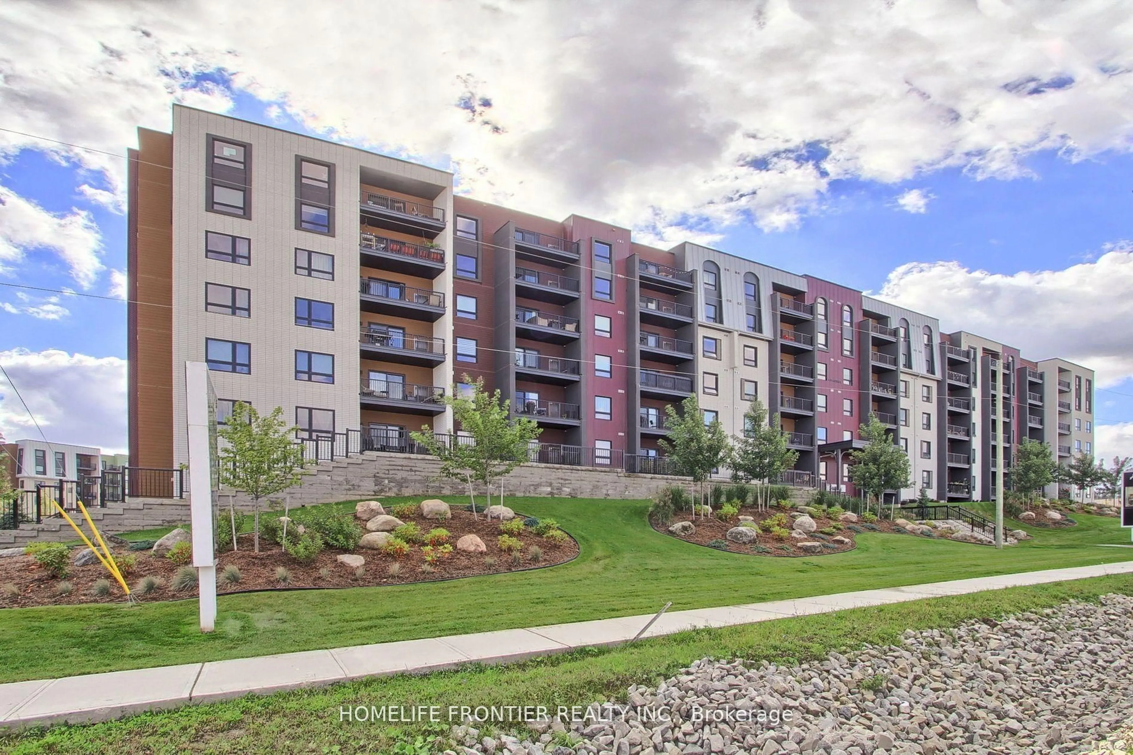 A pic from outside/outdoor area/front of a property/back of a property/a pic from drone, unknown for 4 Spice Way #318, Barrie Ontario L9J 0M2