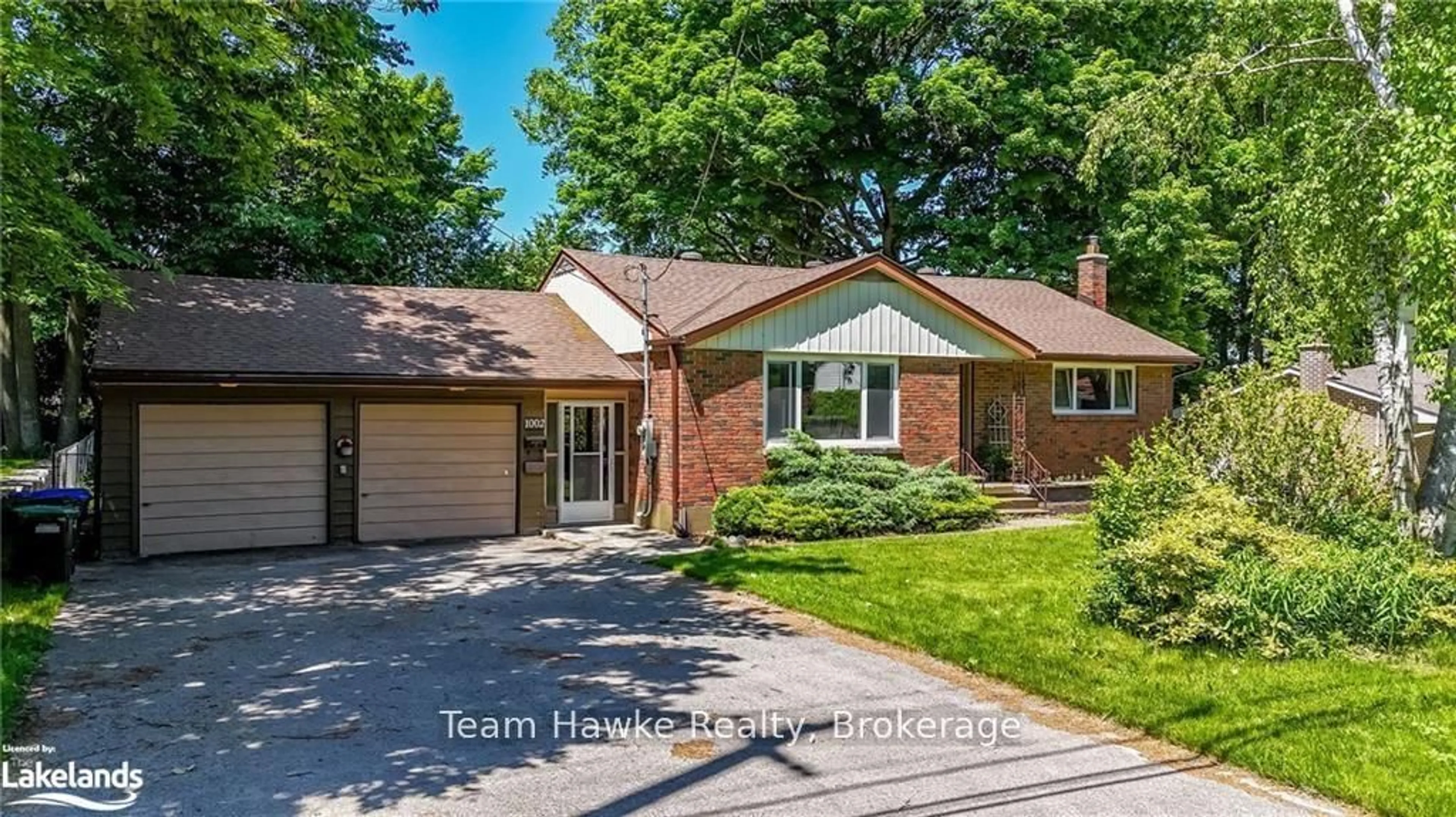 Home with brick exterior material, street for 1002 Hugel Ave, Midland Ontario L4R 1Y1