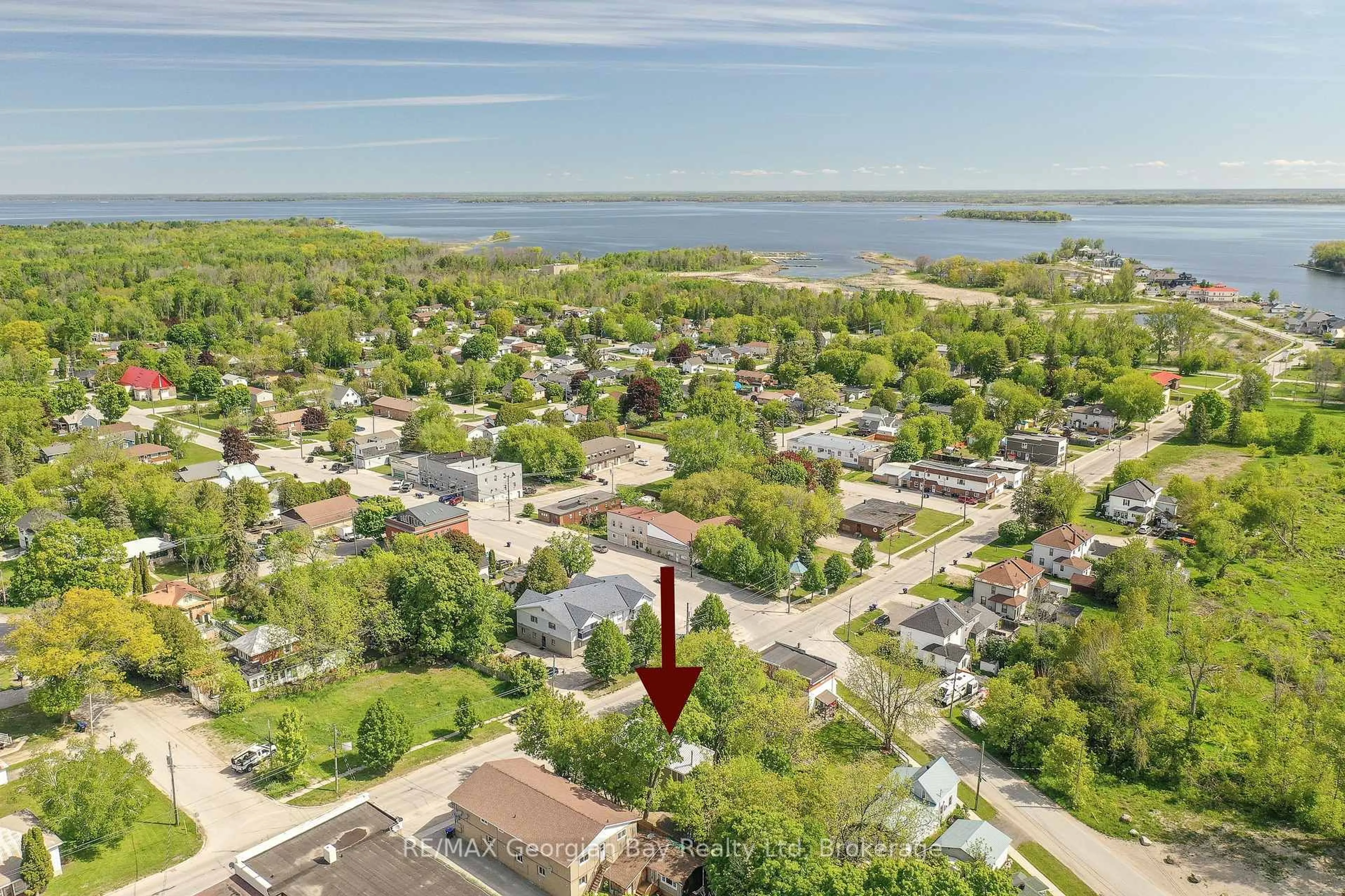 A pic from outside/outdoor area/front of a property/back of a property/a pic from drone, water/lake/river/ocean view for 415 Talbot St, Tay Ontario L0K 1R0