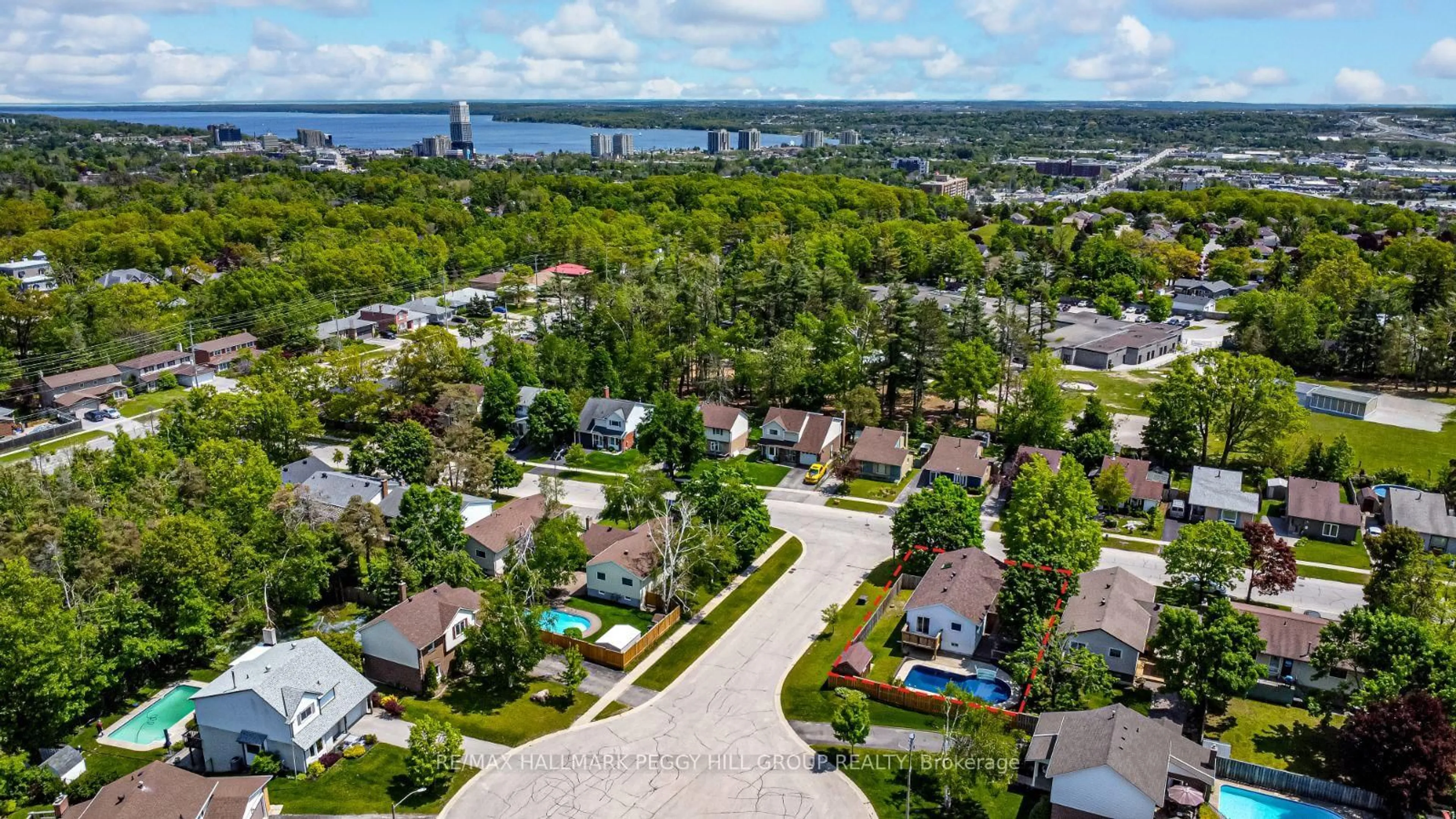 A pic from outside/outdoor area/front of a property/back of a property/a pic from drone, water/lake/river/ocean view for 20 Shelley Lane, Barrie Ontario L4N 4X8