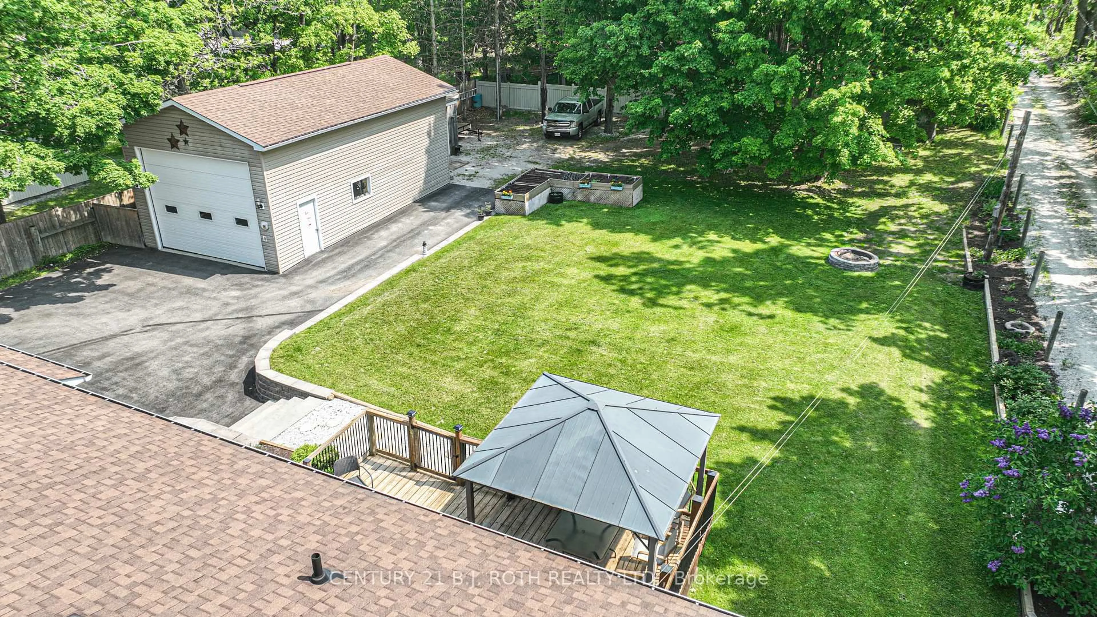A pic from outside/outdoor area/front of a property/back of a property/a pic from drone, street for 141 Bass Line, Oro-Medonte Ontario L3V 0J9