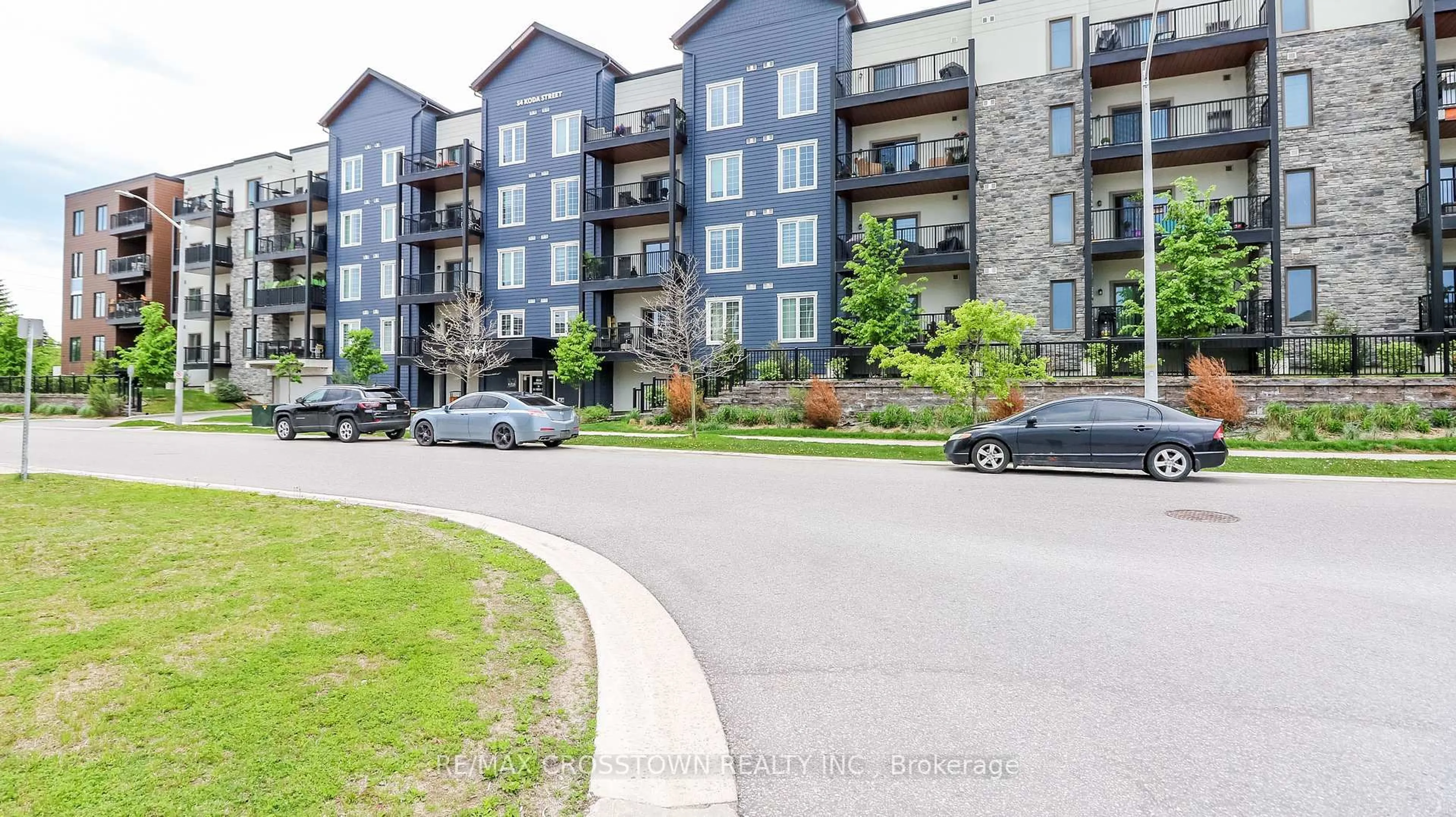 A pic from outside/outdoor area/front of a property/back of a property/a pic from drone, unknown for 54 Koda St #318, Barrie Ontario L9J 0J6