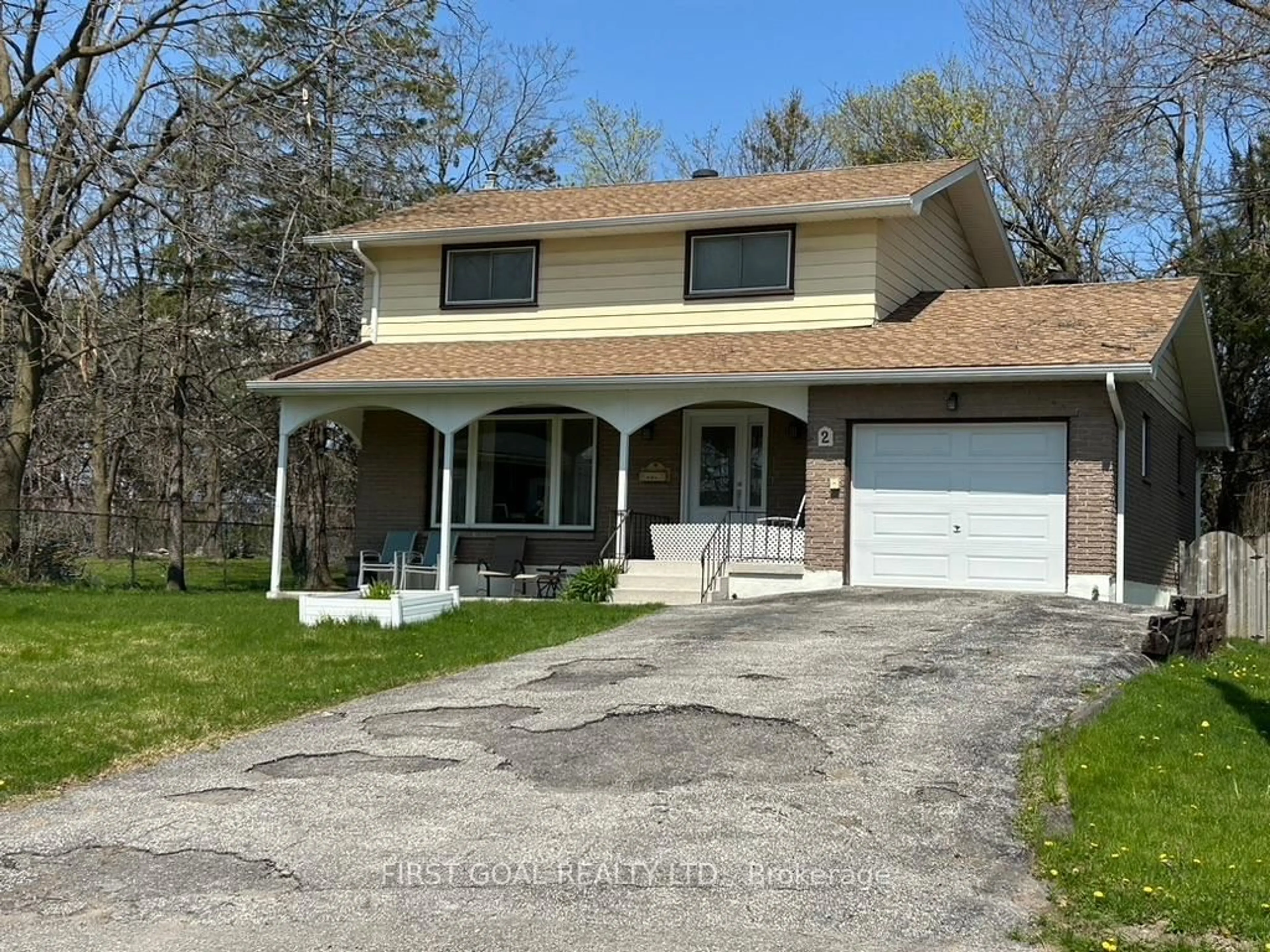 Home with vinyl exterior material, street for 2 Agnes St, Barrie Ontario L4M 2S2