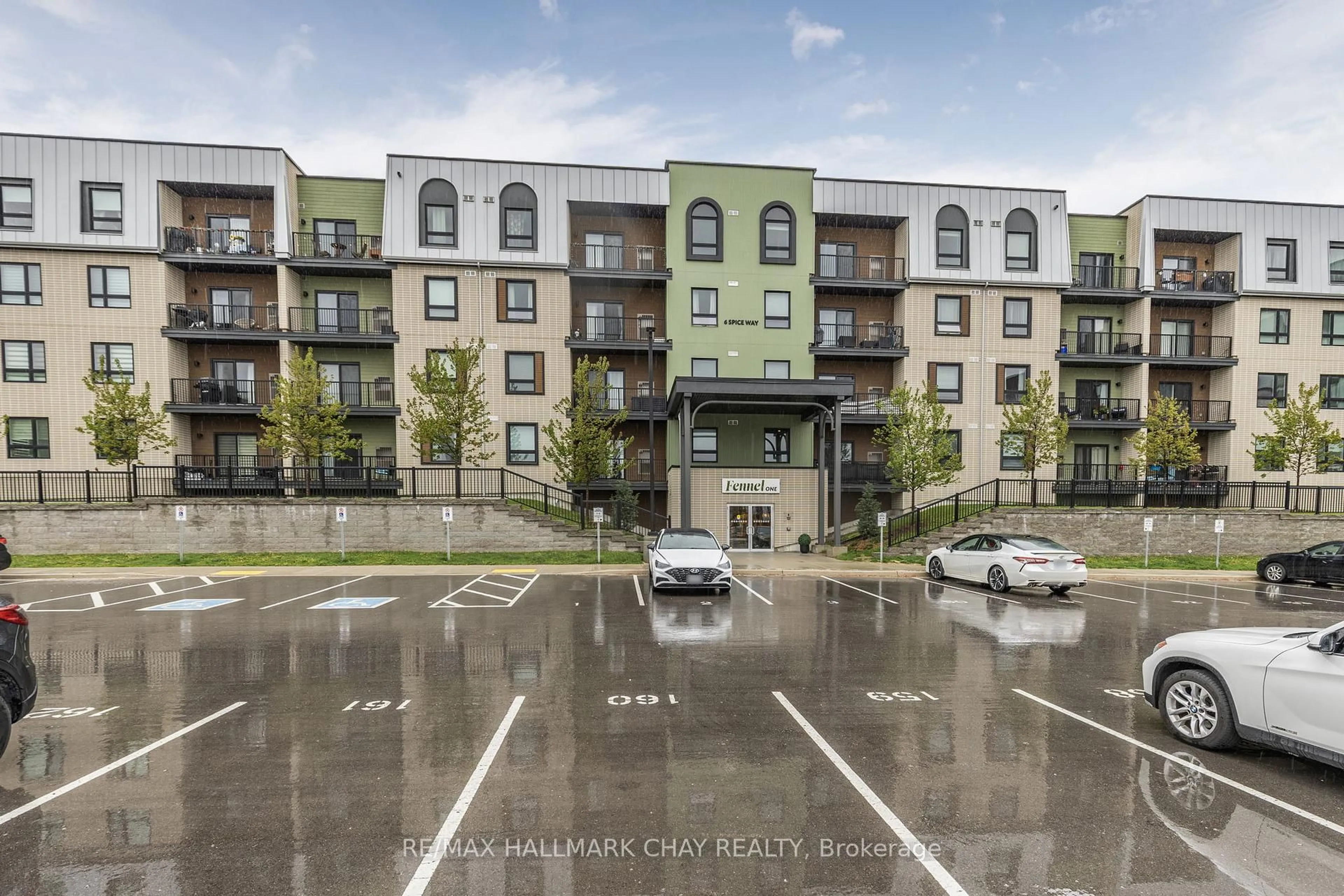 A pic from outside/outdoor area/front of a property/back of a property/a pic from drone, street for 6 Spice Way #208, Barrie Ontario L9J 0J9