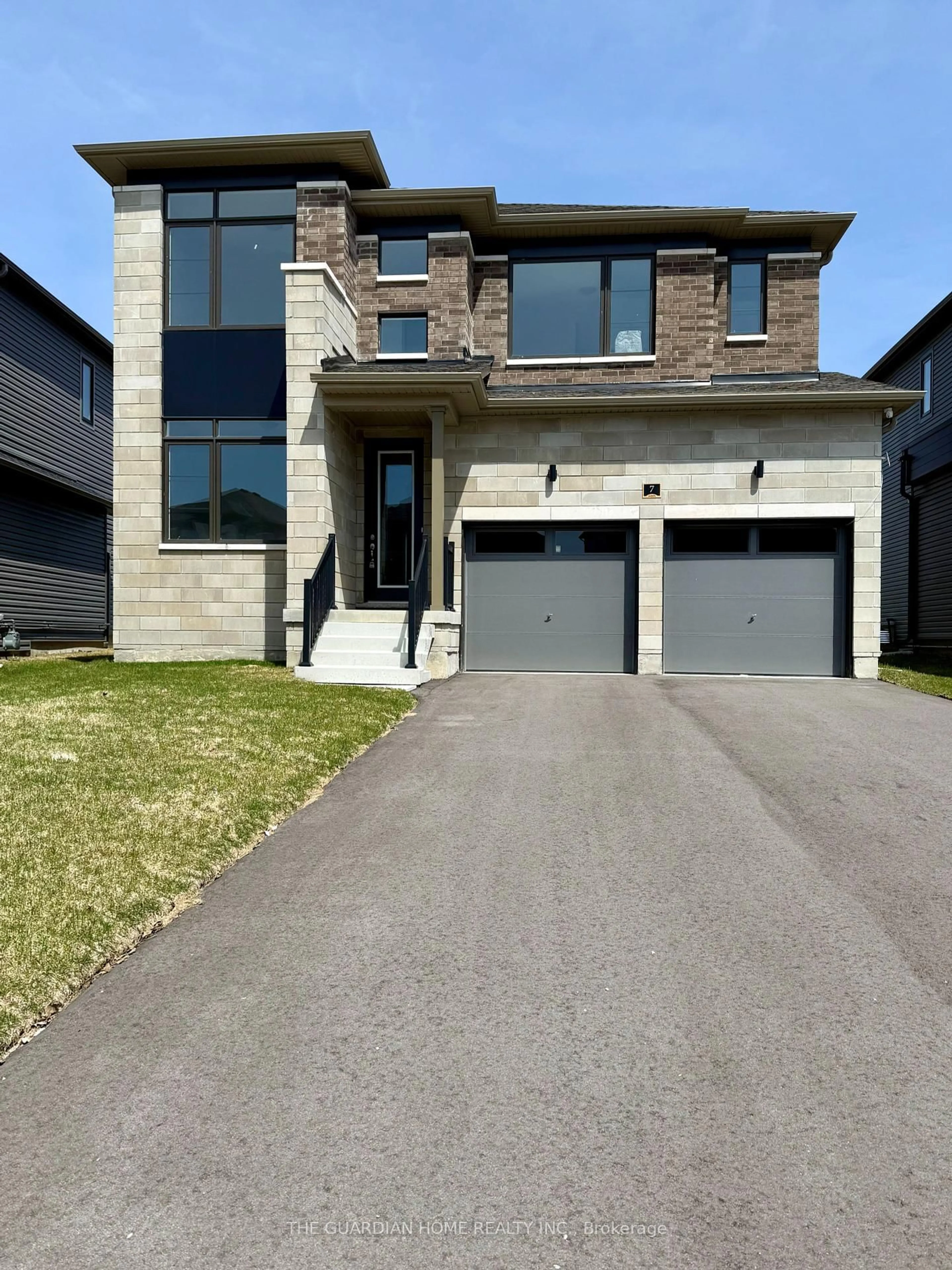 Home with brick exterior material, street for 7 Tran St, Wasaga Beach Ontario L9Z 0M9