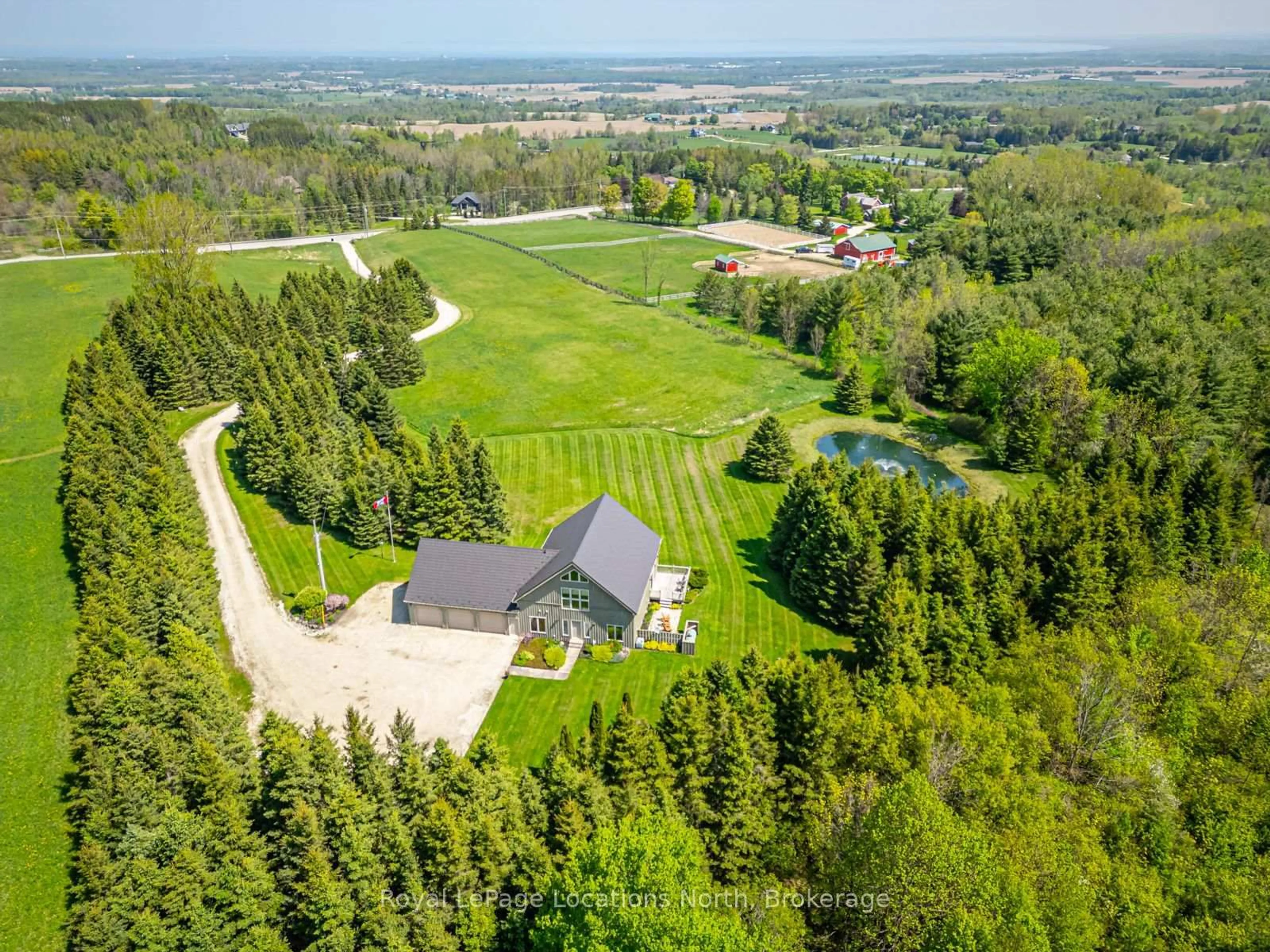 A pic from outside/outdoor area/front of a property/back of a property/a pic from drone, forest/trees view for 9197 County 91 Rd, Clearview Ontario L0M 1H0