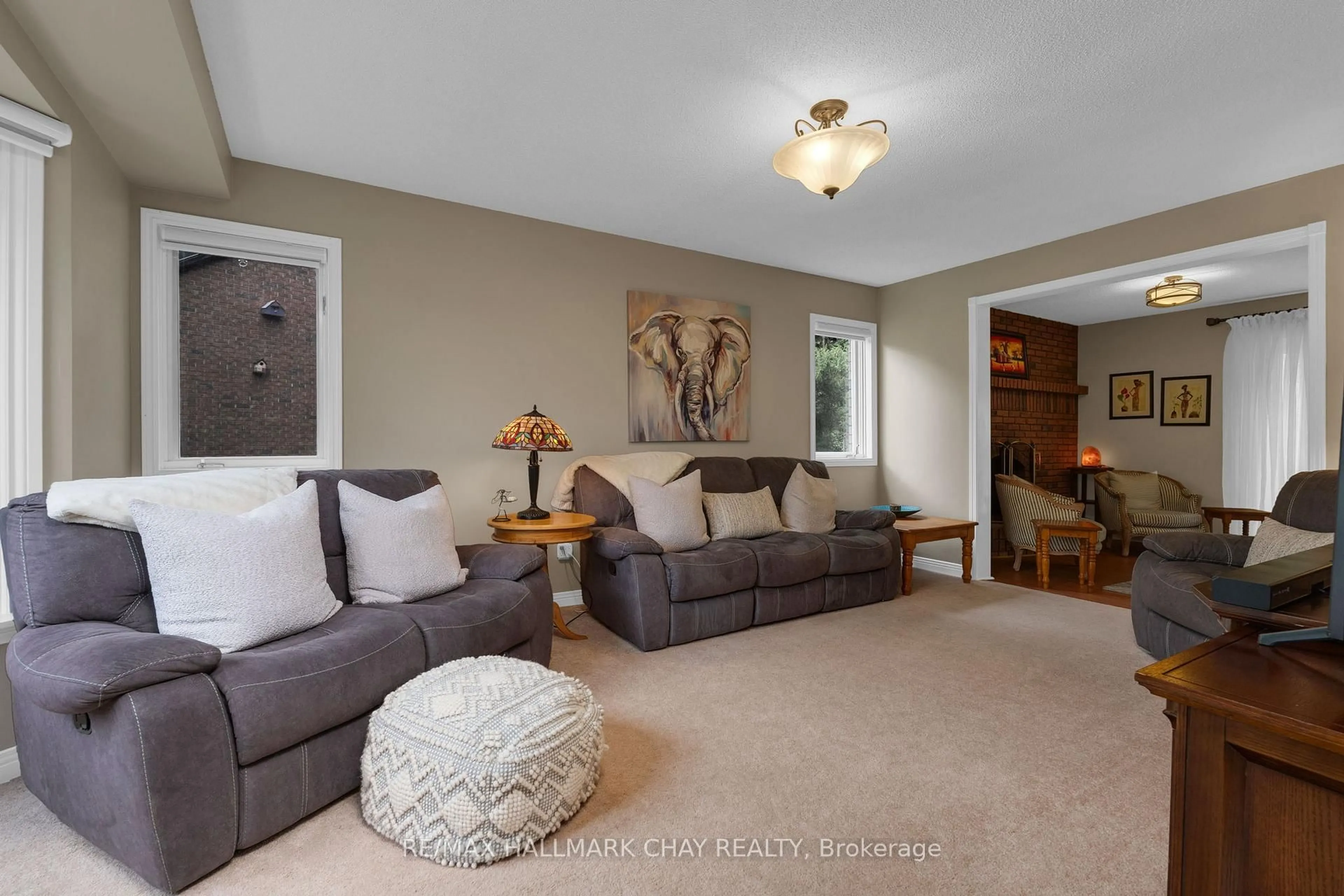 Living room with furniture, unknown for 4 IDLEWOOD Dr, Springwater Ontario L0L 1X1