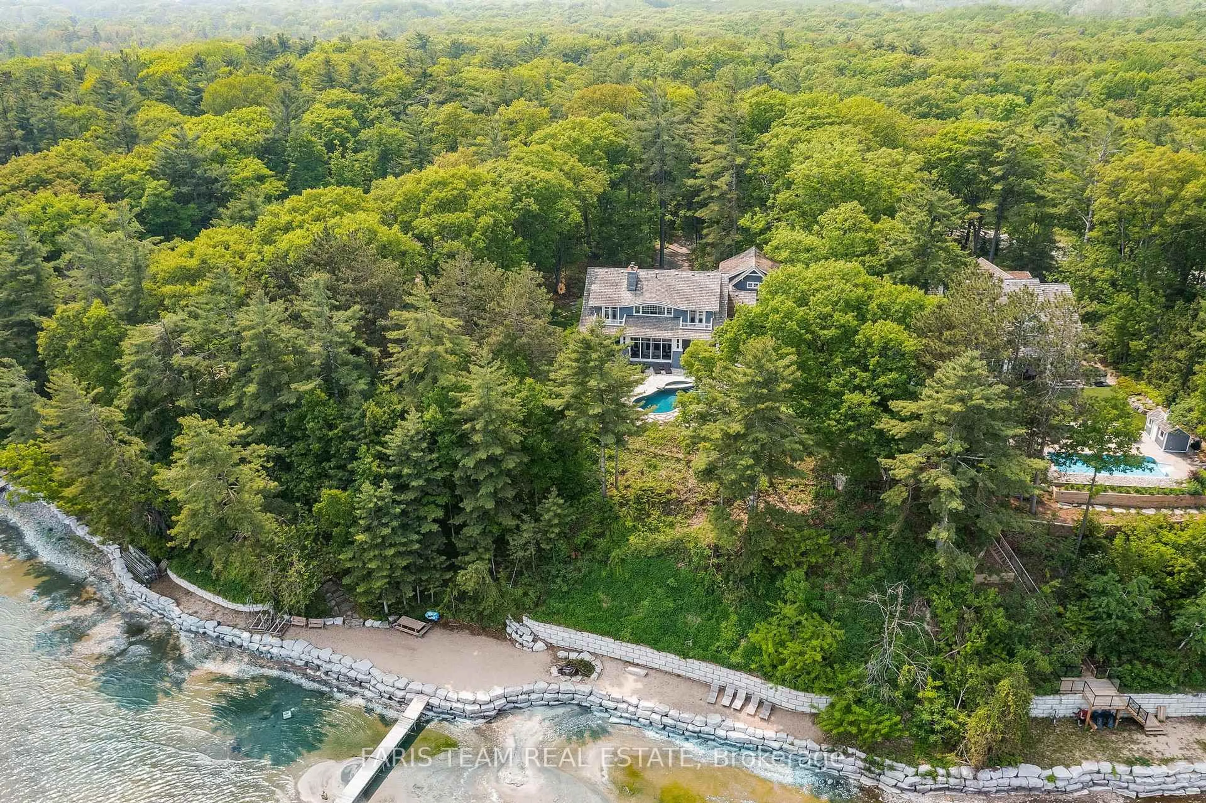 A pic from outside/outdoor area/front of a property/back of a property/a pic from drone, water/lake/river/ocean view for 1375 Champlain Rd, Tiny Ontario L9M 0C1