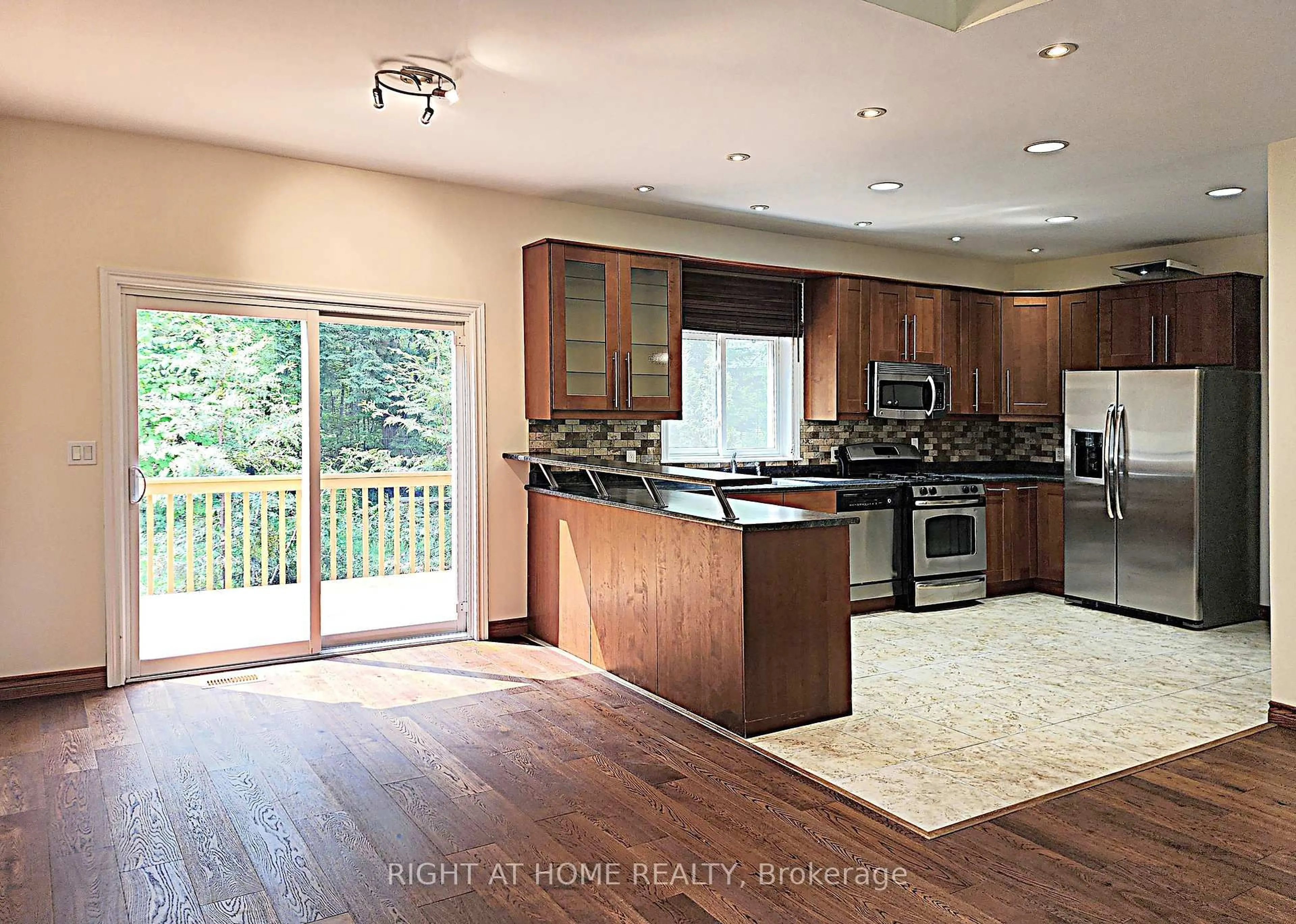 Open concept kitchen, unknown for 2384 Champlain Rd, Tiny Ontario L9M 0C9