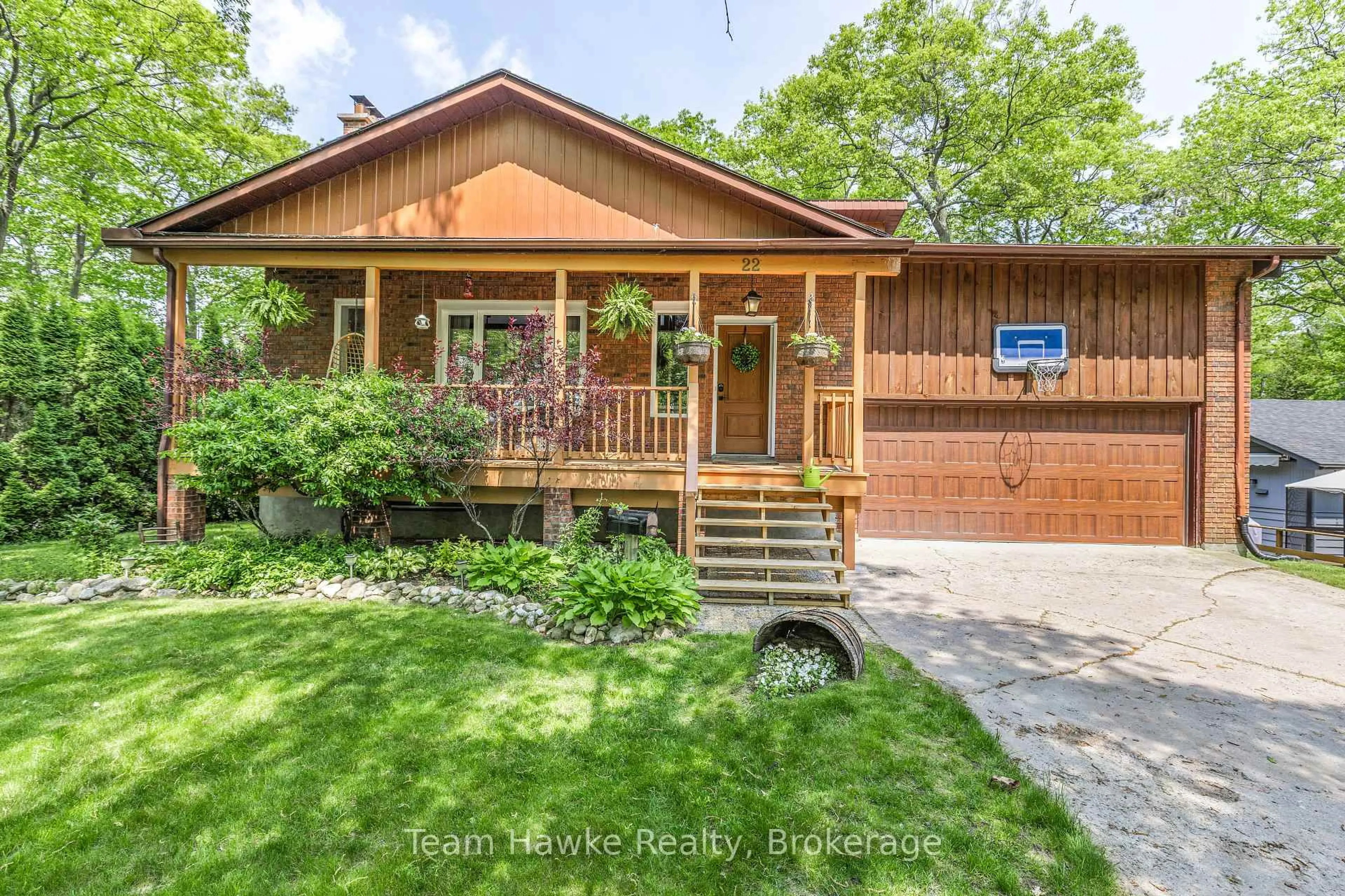 Home with brick exterior material, street for 22 Cabell Rd, Tiny Ontario L0L 1P1