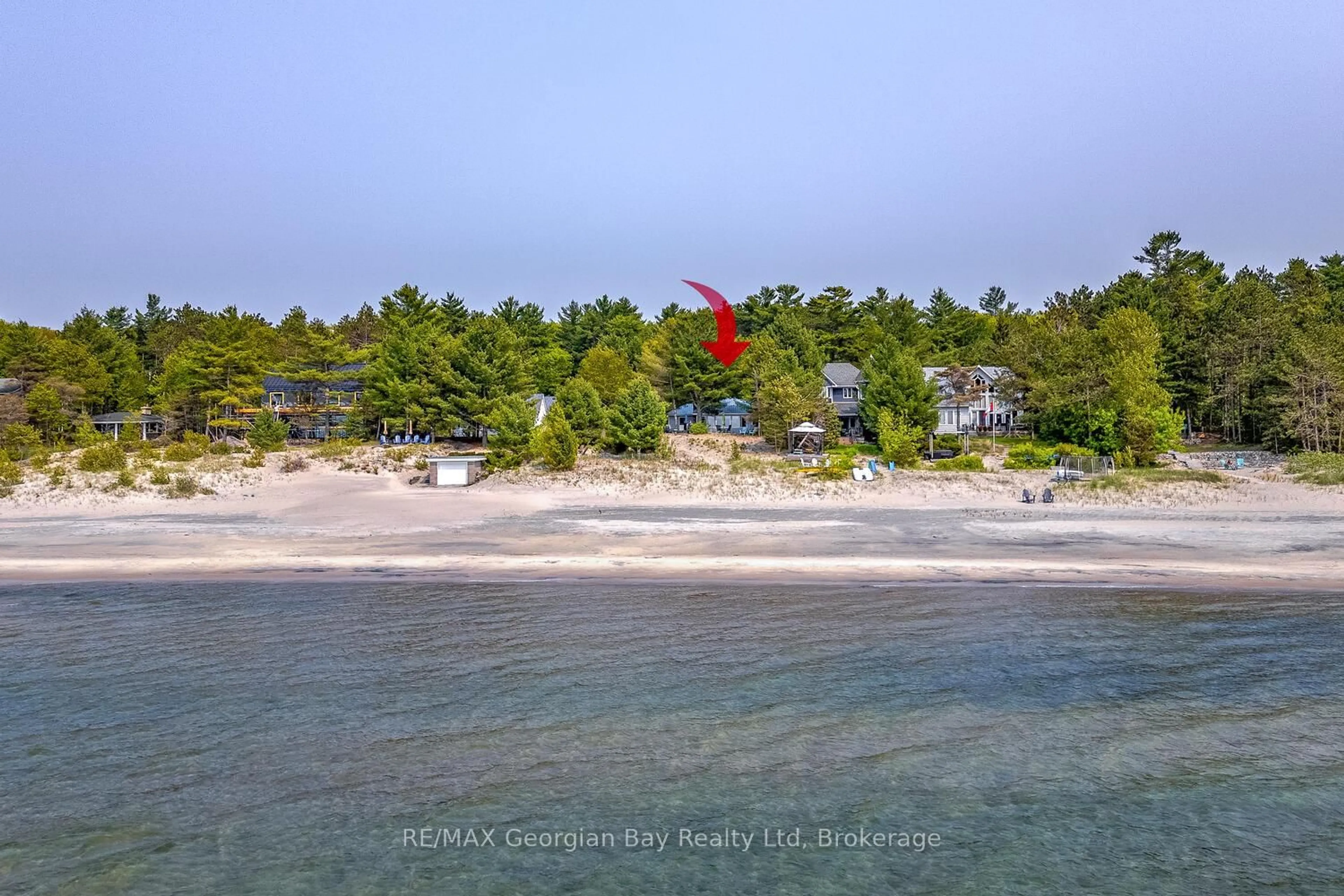 A pic from outside/outdoor area/front of a property/back of a property/a pic from drone, water/lake/river/ocean view for 760 Tiny Beaches Rd, Tiny Ontario L0L 2T0
