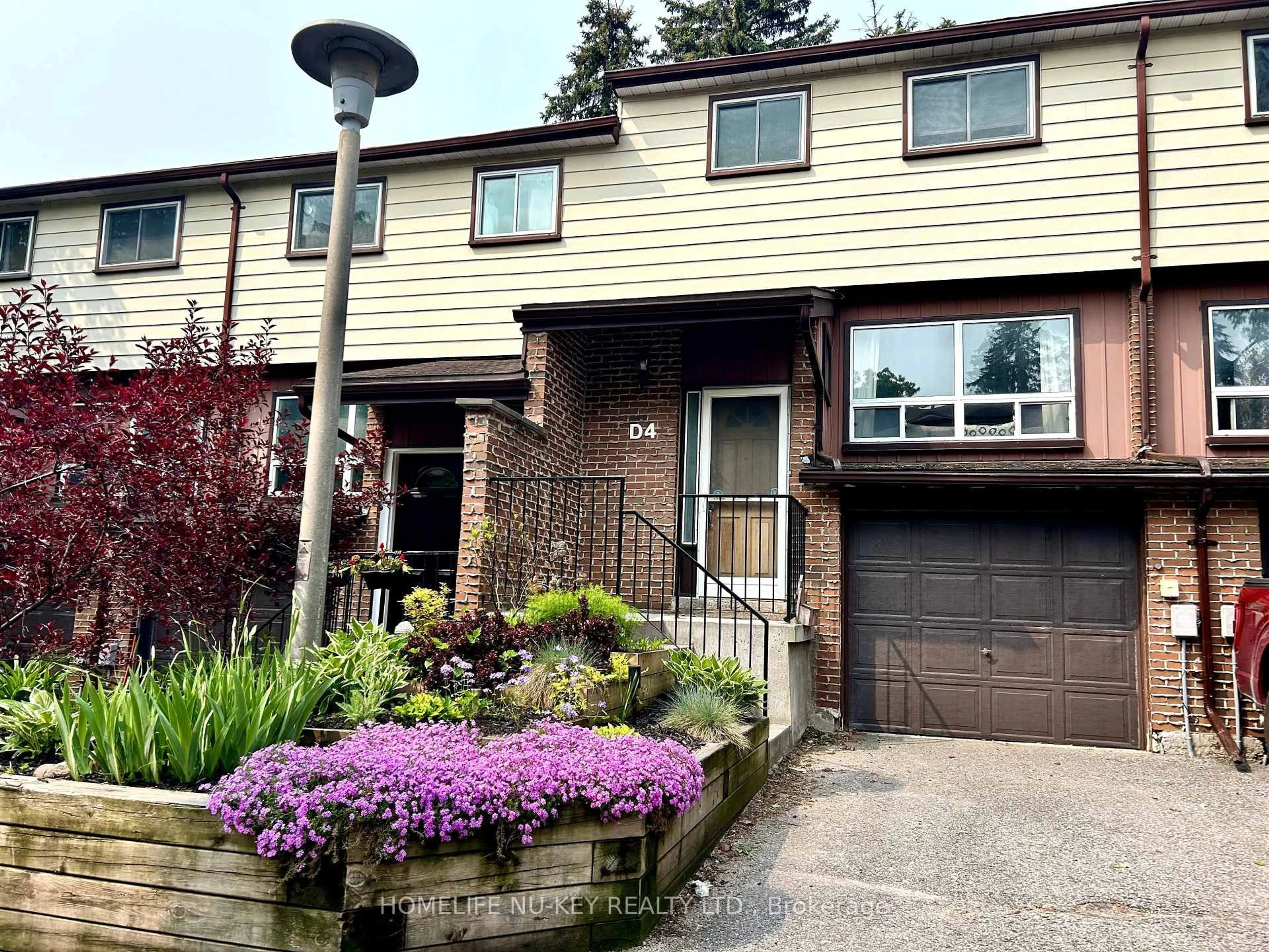 Home with vinyl exterior material, street for 63 Ferris Lane #D4, Barrie Ontario L4M 5C4