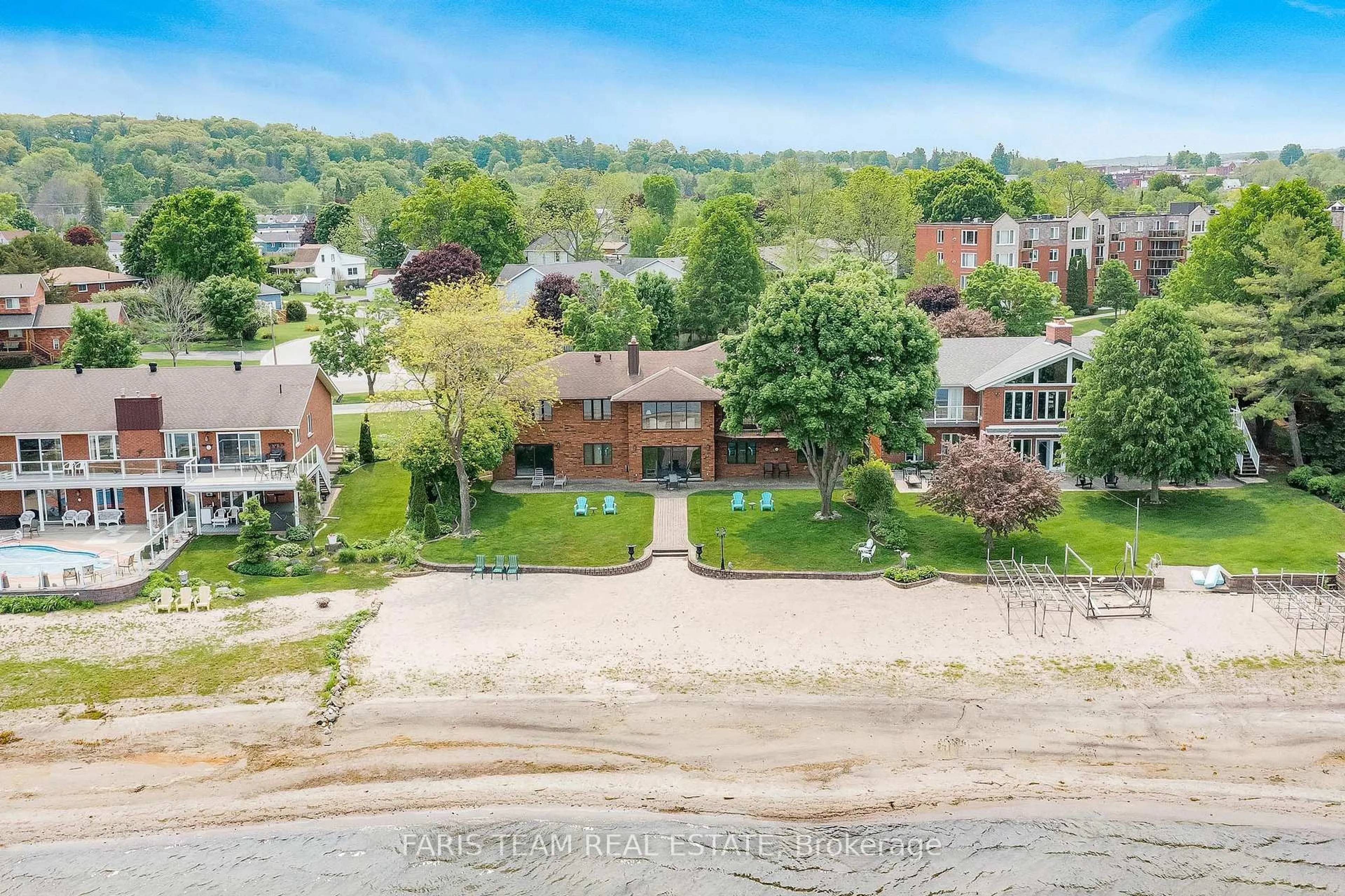 A pic from outside/outdoor area/front of a property/back of a property/a pic from drone, water/lake/river/ocean view for 16 Beck Blvd, Penetanguishene Ontario L9M 1C3