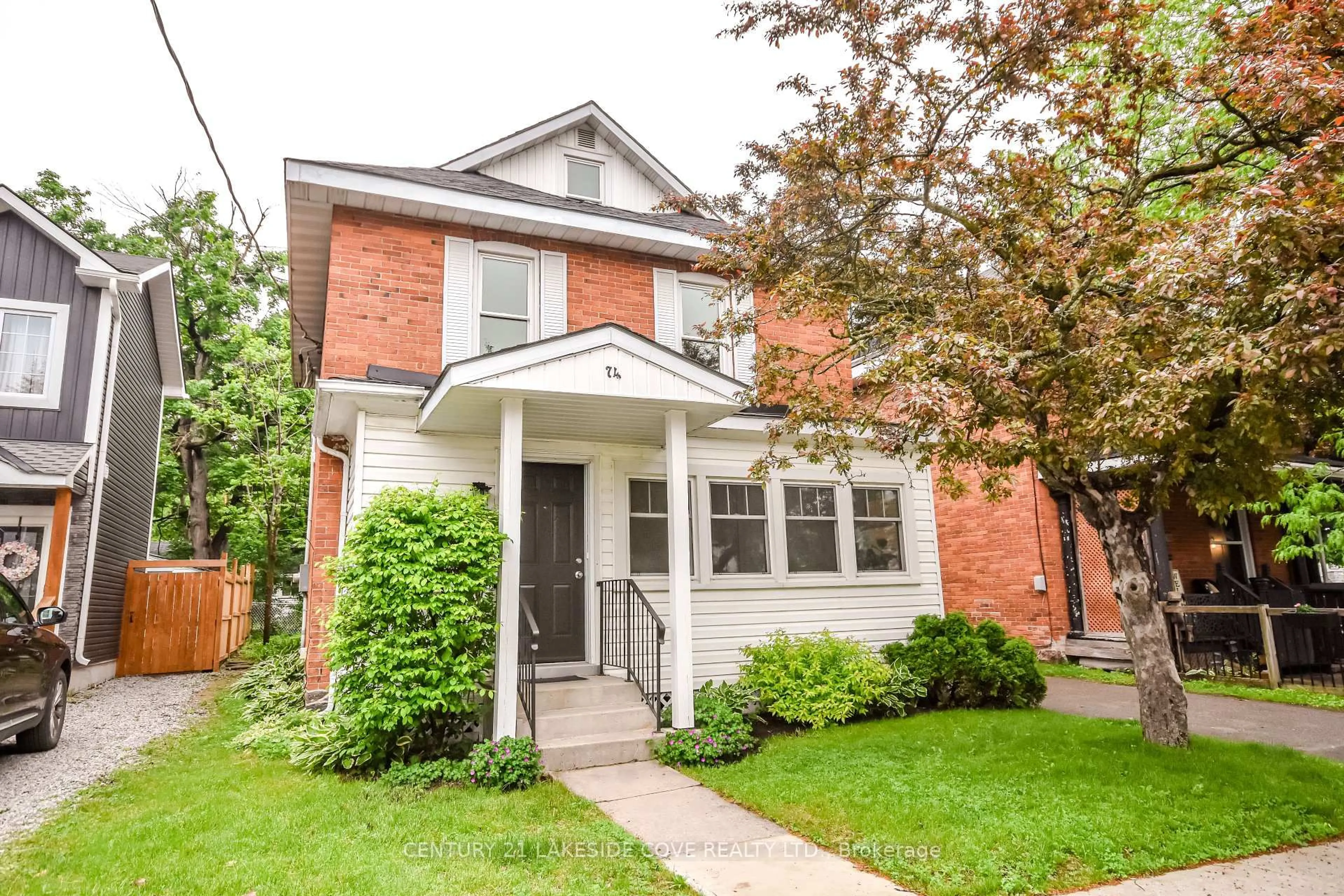 Home with brick exterior material, street for 74 Penetang St, Orillia Ontario L3V 3N5