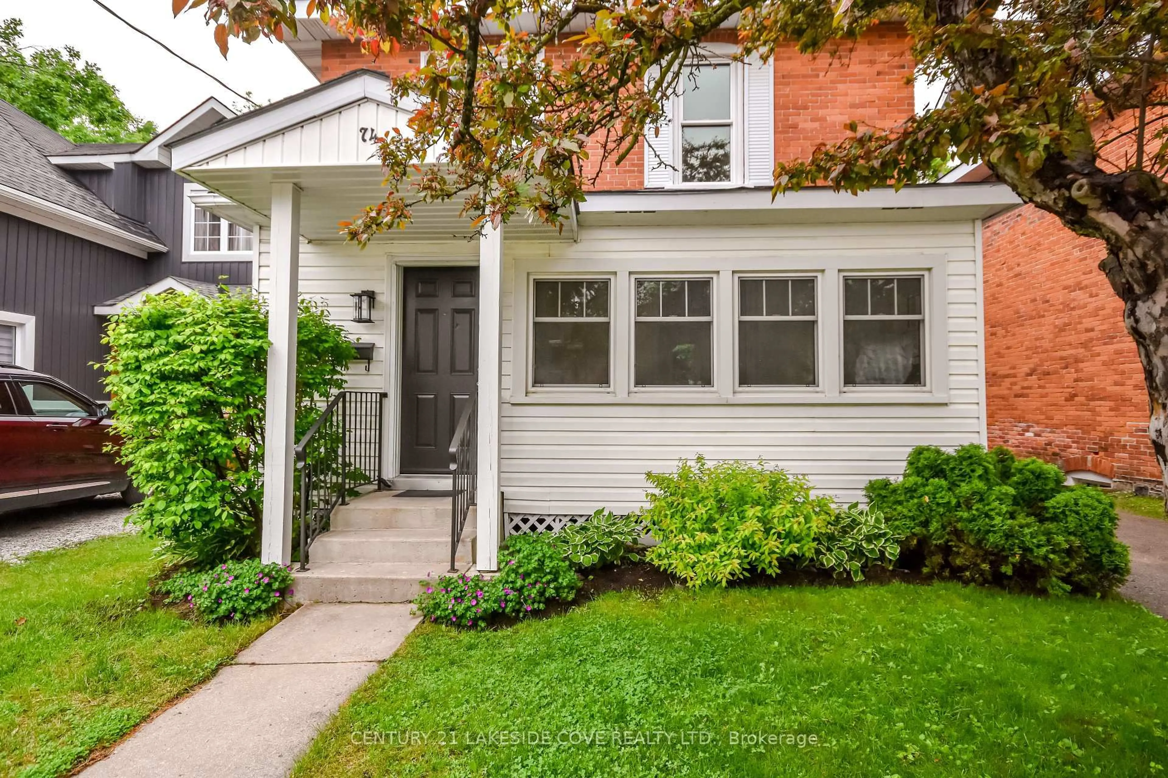Home with brick exterior material, street for 74 Penetang St, Orillia Ontario L3V 3N5