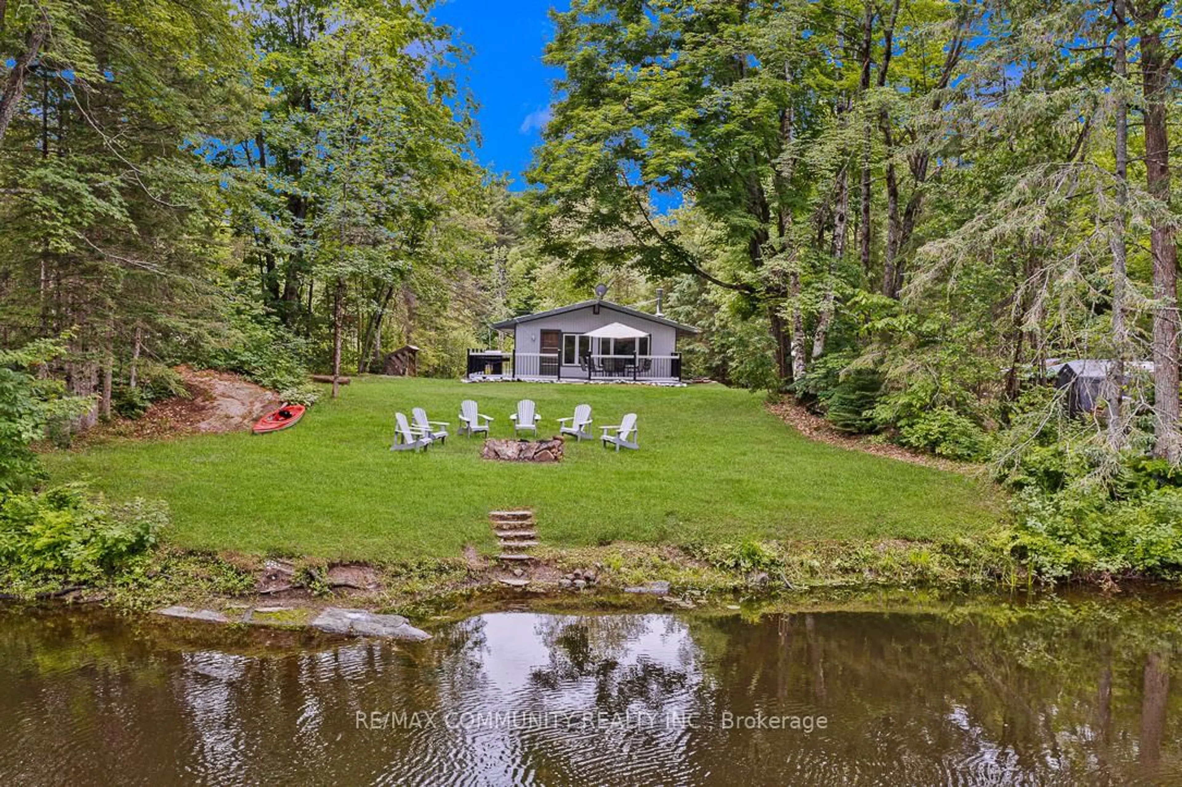 A pic from outside/outdoor area/front of a property/back of a property/a pic from drone, water/lake/river/ocean view for 6605 Pioneer Village Lane, Ramara Ontario L0K 1W0