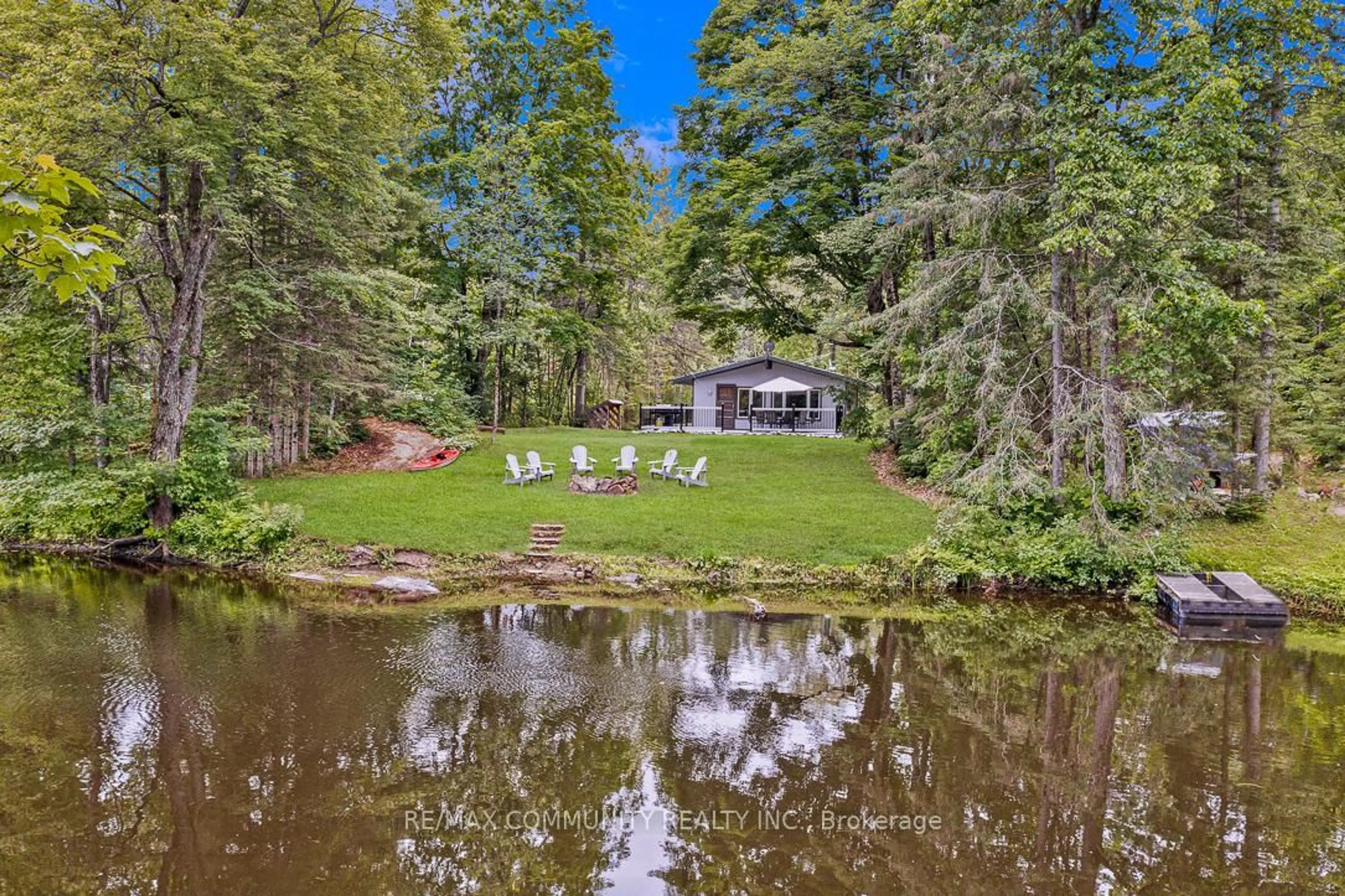 A pic from outside/outdoor area/front of a property/back of a property/a pic from drone, water/lake/river/ocean view for 6605 Pioneer Village Lane, Ramara Ontario L0K 1W0