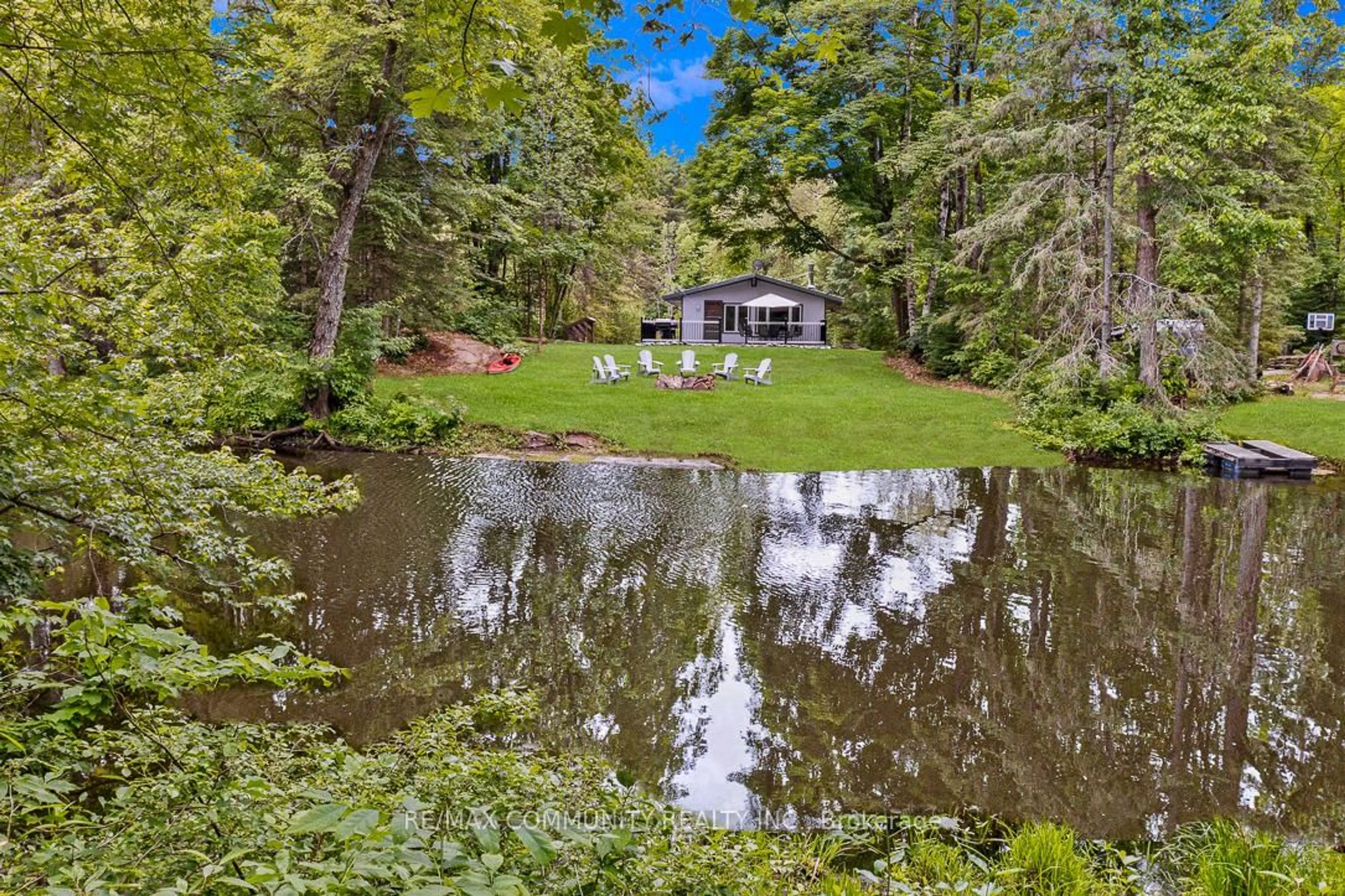 A pic from outside/outdoor area/front of a property/back of a property/a pic from drone, water/lake/river/ocean view for 6605 Pioneer Village Lane, Ramara Ontario L0K 1W0